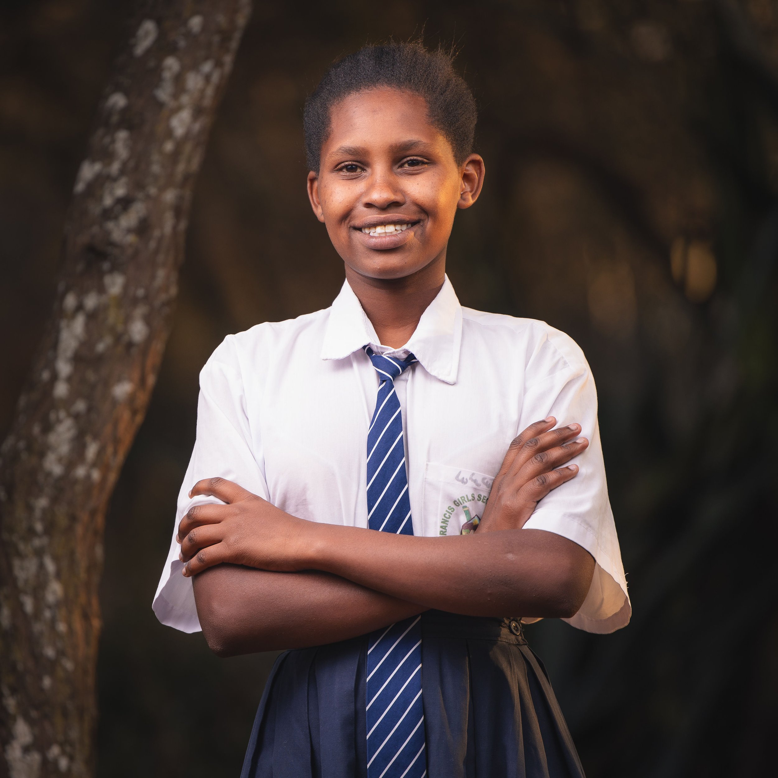 Jackline Nasha | Jackline enjoys science and math. She is 17y years old and plans to be a doctor. Jackline describes herself as hardworking, responsible and obedient. She is grateful to be sponsored by the AMGP for high school.