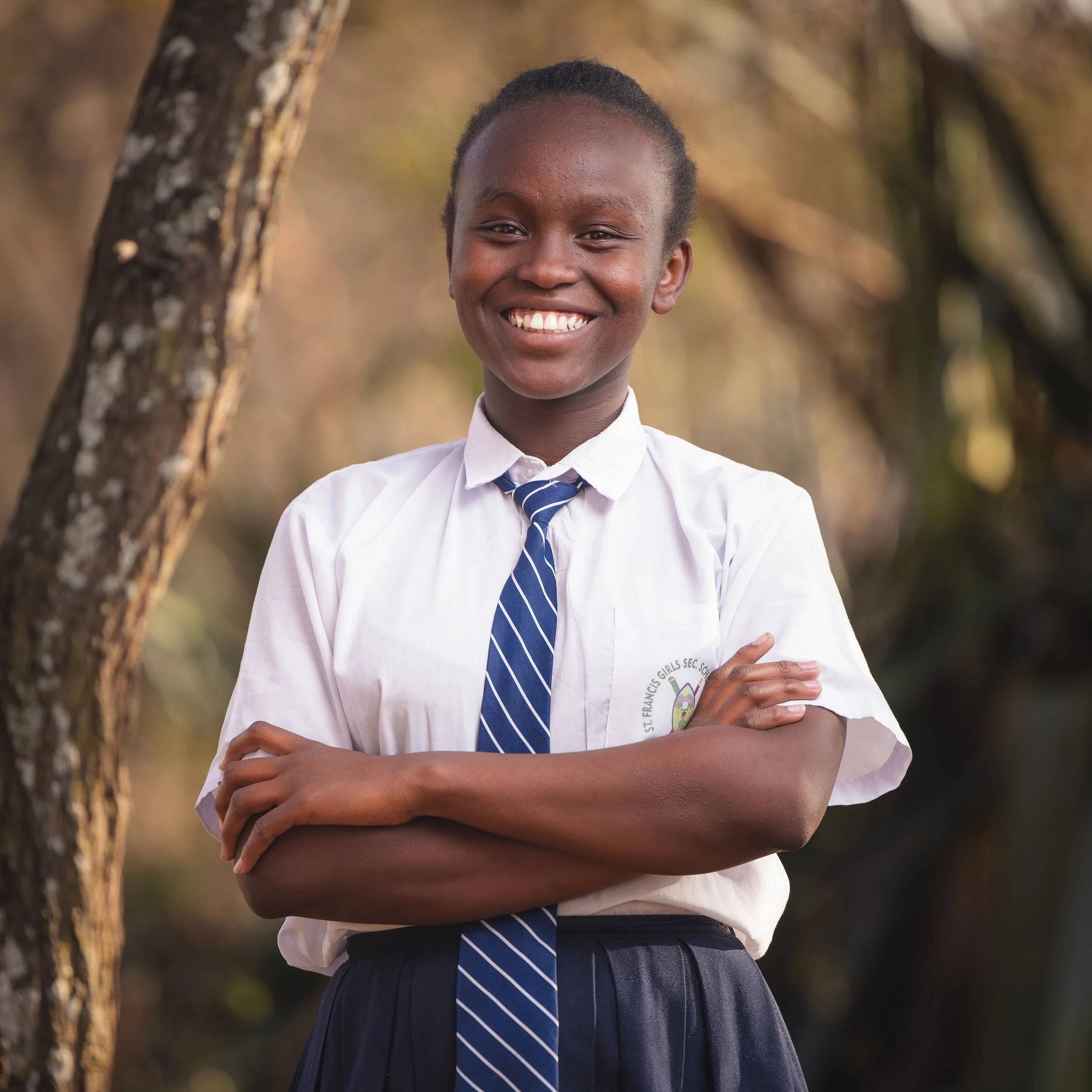 Celestine Chemu | Celestine is 17 years old and a junior in high school. She hopes to become a lecturer someday. She describes herself as hardworking, respectful and honest. Celestine has been raised by a single parent who does their best with what t