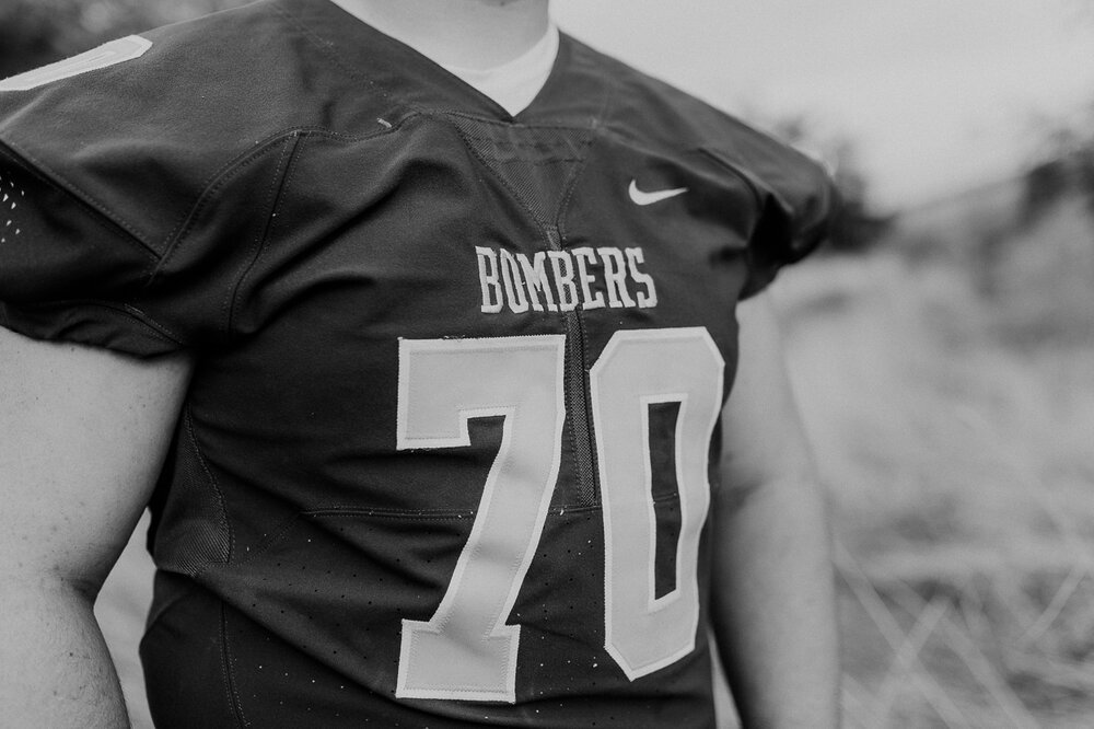 Black and White Football Jersey Senior Photos | 400 Lux Photography