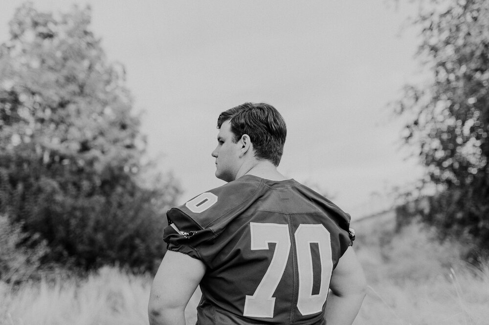 Black and White Football Jersey Senior Photos | 400 Lux Photography
