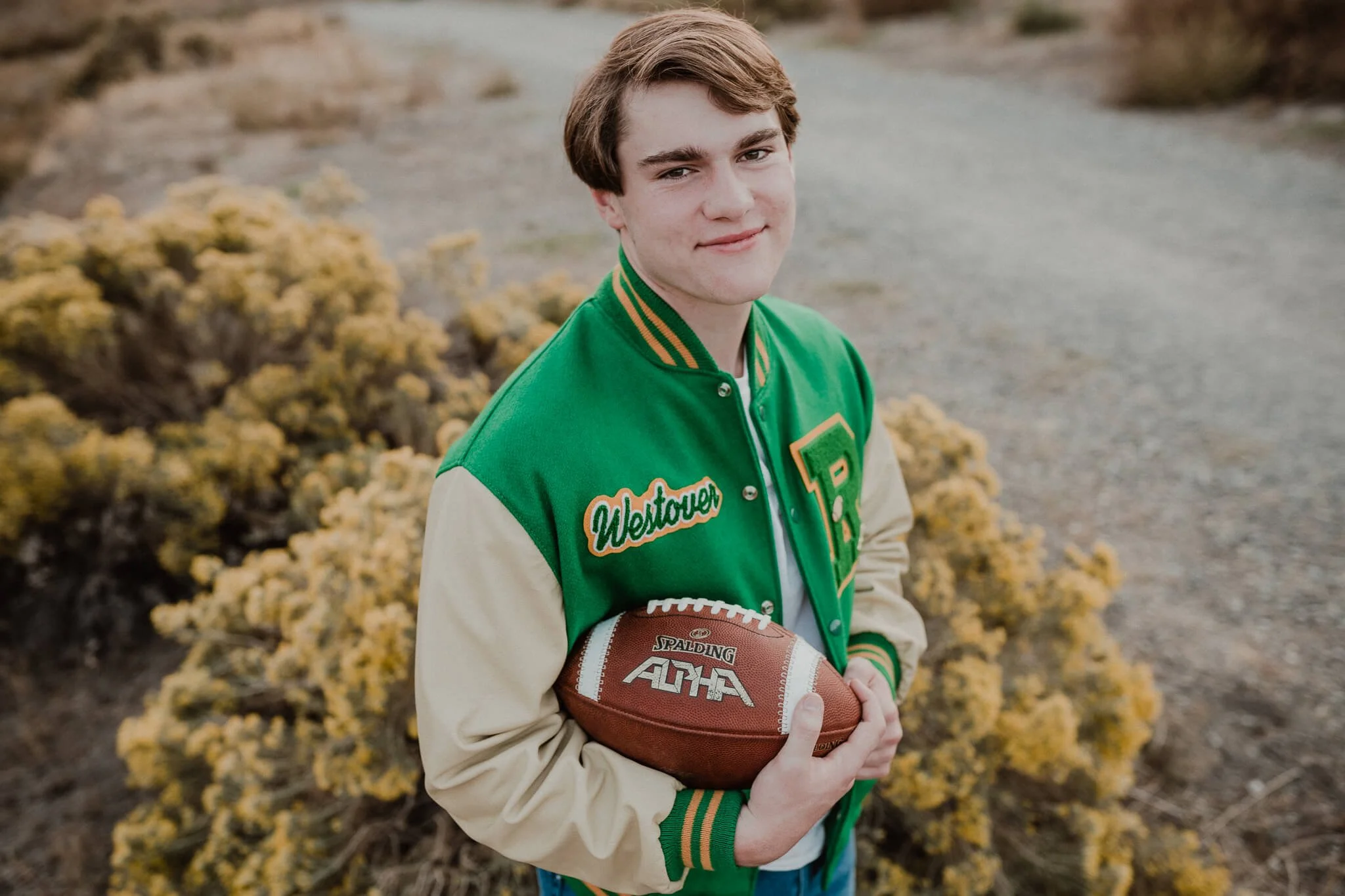 Football Player Senior Pictures Letterman Jacket Inspiration — 400