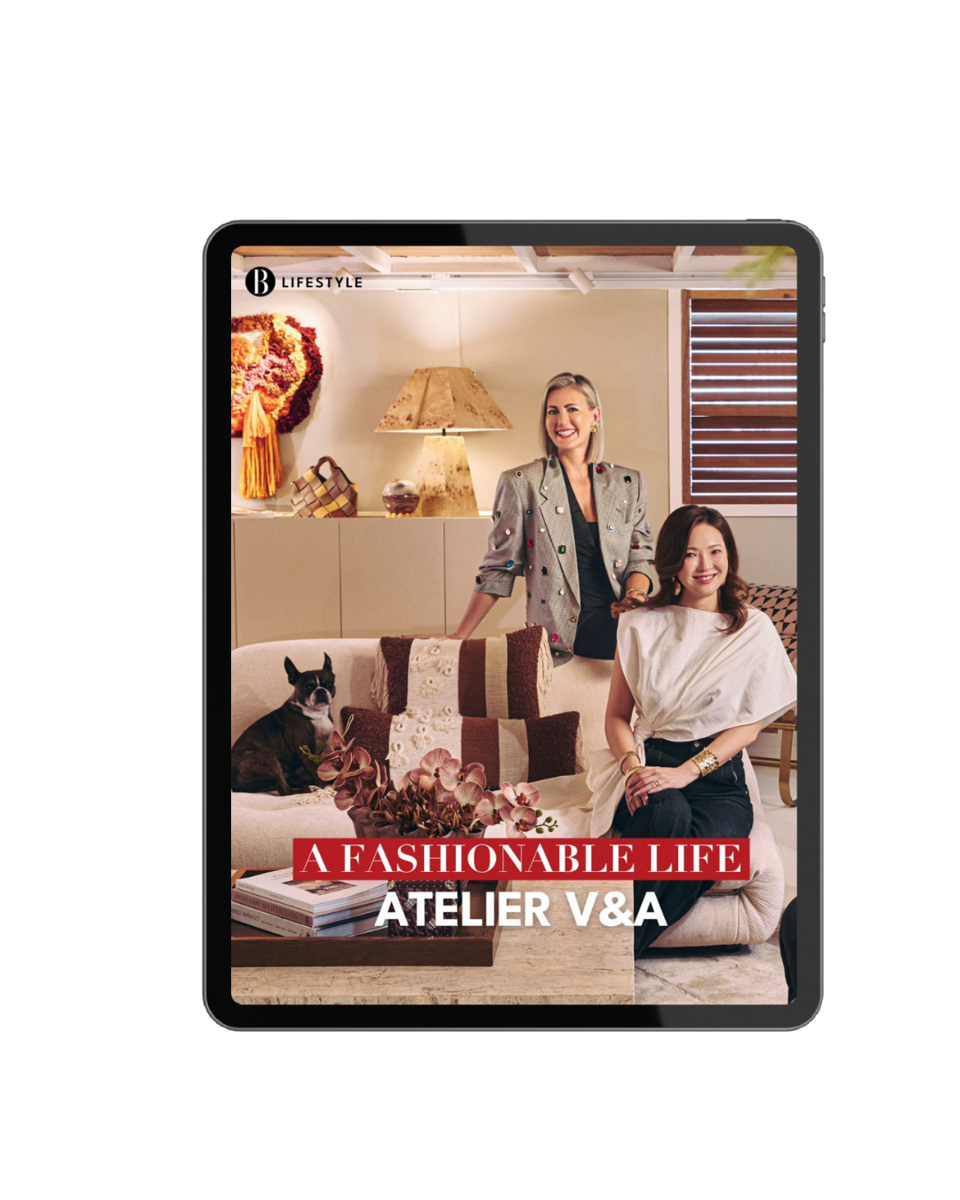 Cover of a lifestyle magazine titled "A Fashionable Life" featuring two women and a dog in a stylish living room with modern decor.