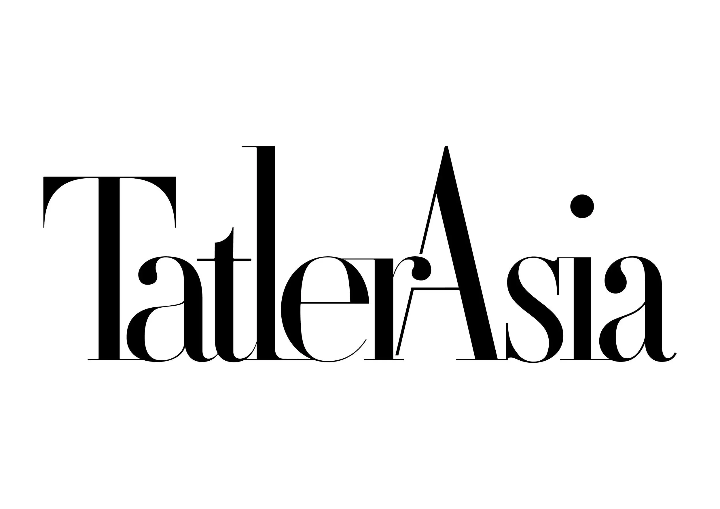 Close-up of black text on a white background that says "Tell a" in large serif font.
