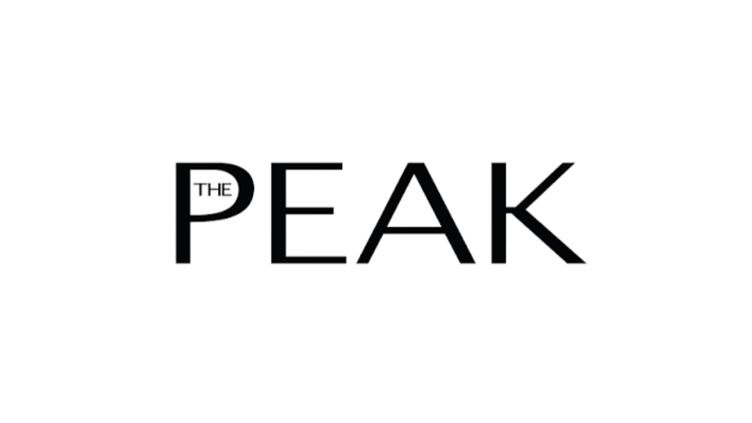 A black and white image of a mountain with the word 'PEAK' overlaid in large letters.