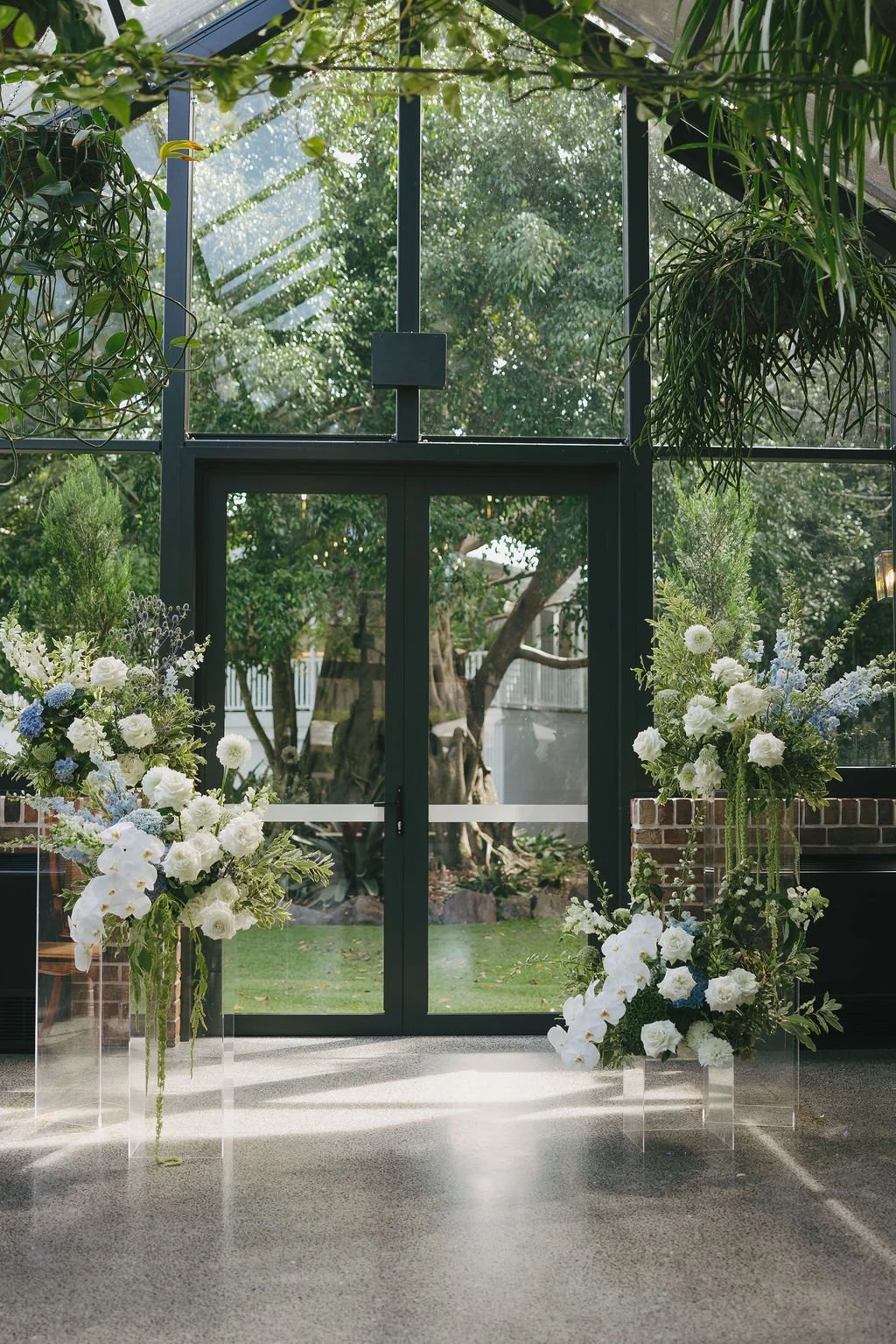 Floral arrangement detail at the Glass House ceremony, The Valley Estate