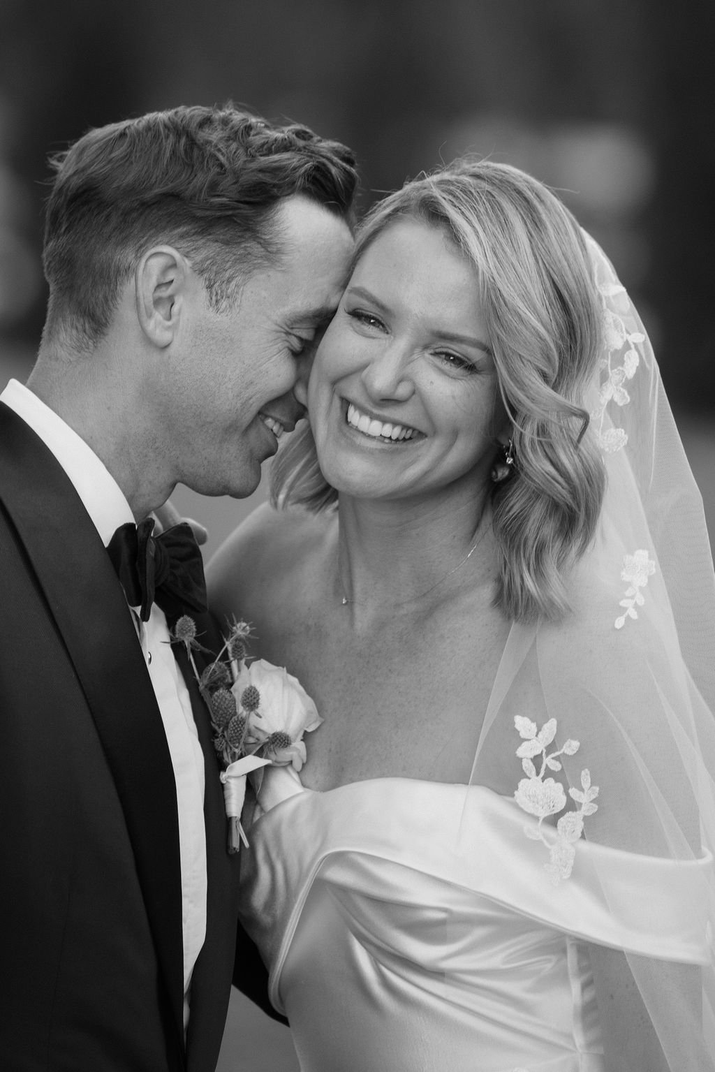 Bride laughing during a candid portrait moment