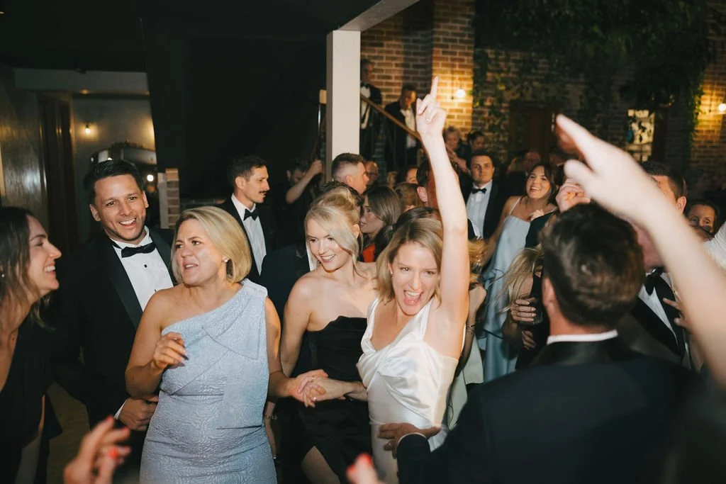 Guests dancing at wedding 