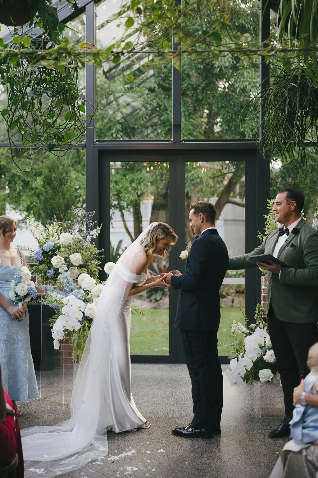 Close-up of the bride and groom exchanging vows