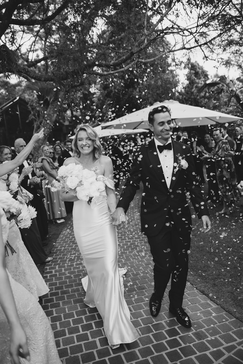 Guests clapping and cheering after the ceremony