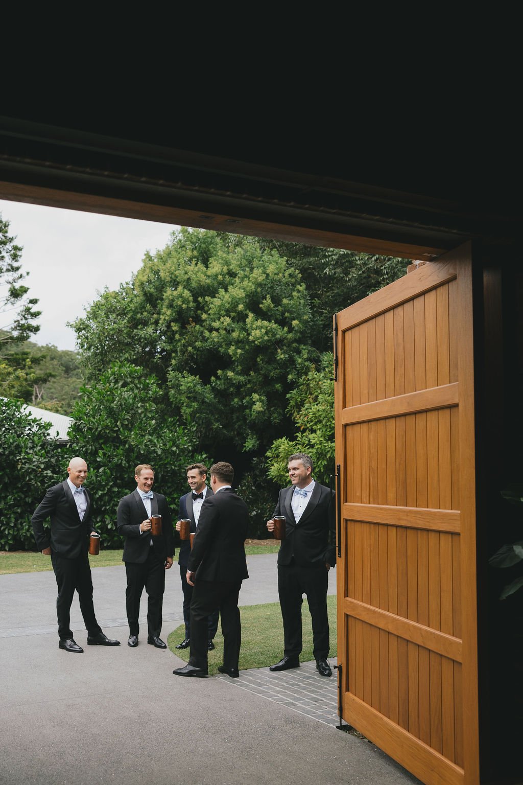 Group shot of all groomsmen at the wedding 