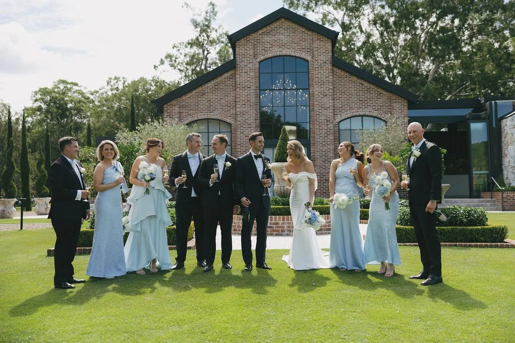 Bridal party group photo on the lawn at The Valley Estate