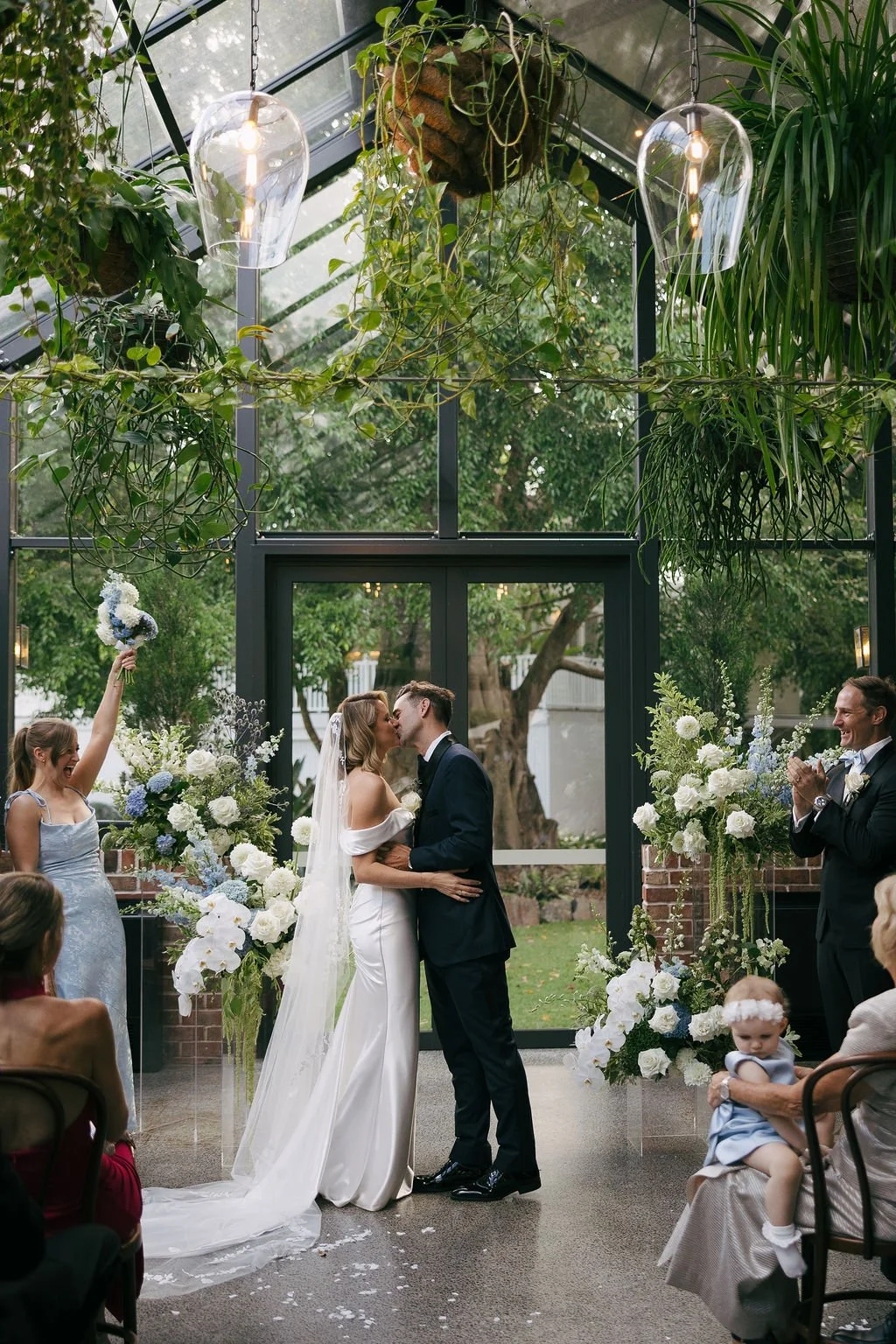 First kiss as newly married husband and wife