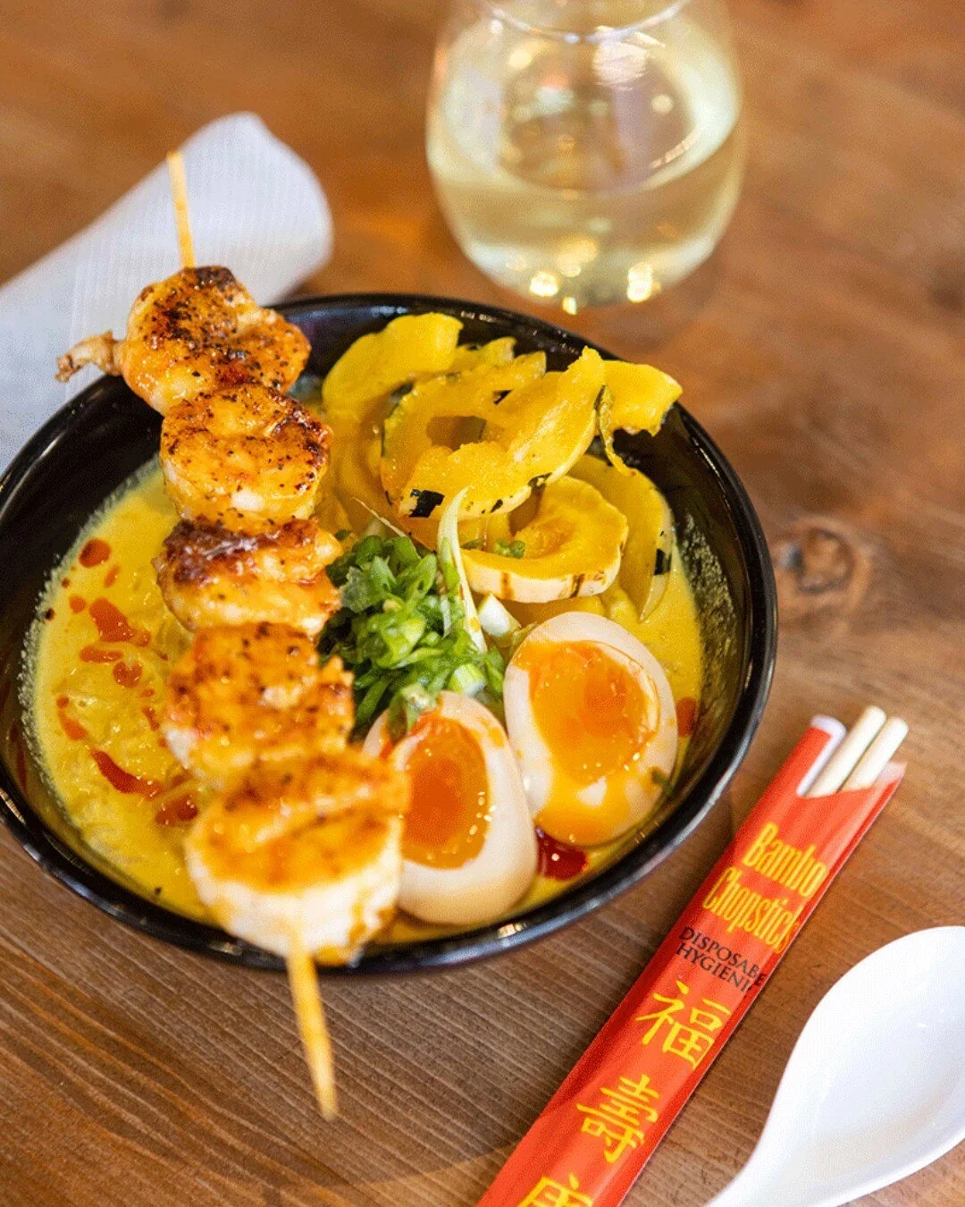 There's nothing quite like the comforting Coconut Curry Ramen, Thai grilled shrimp, 6-minute egg, delicata squash Togarashi chili oil, kaffir leaf, lime and the taste? Absolutely divine. We have prepared a delightful medley of flavors to chase away t