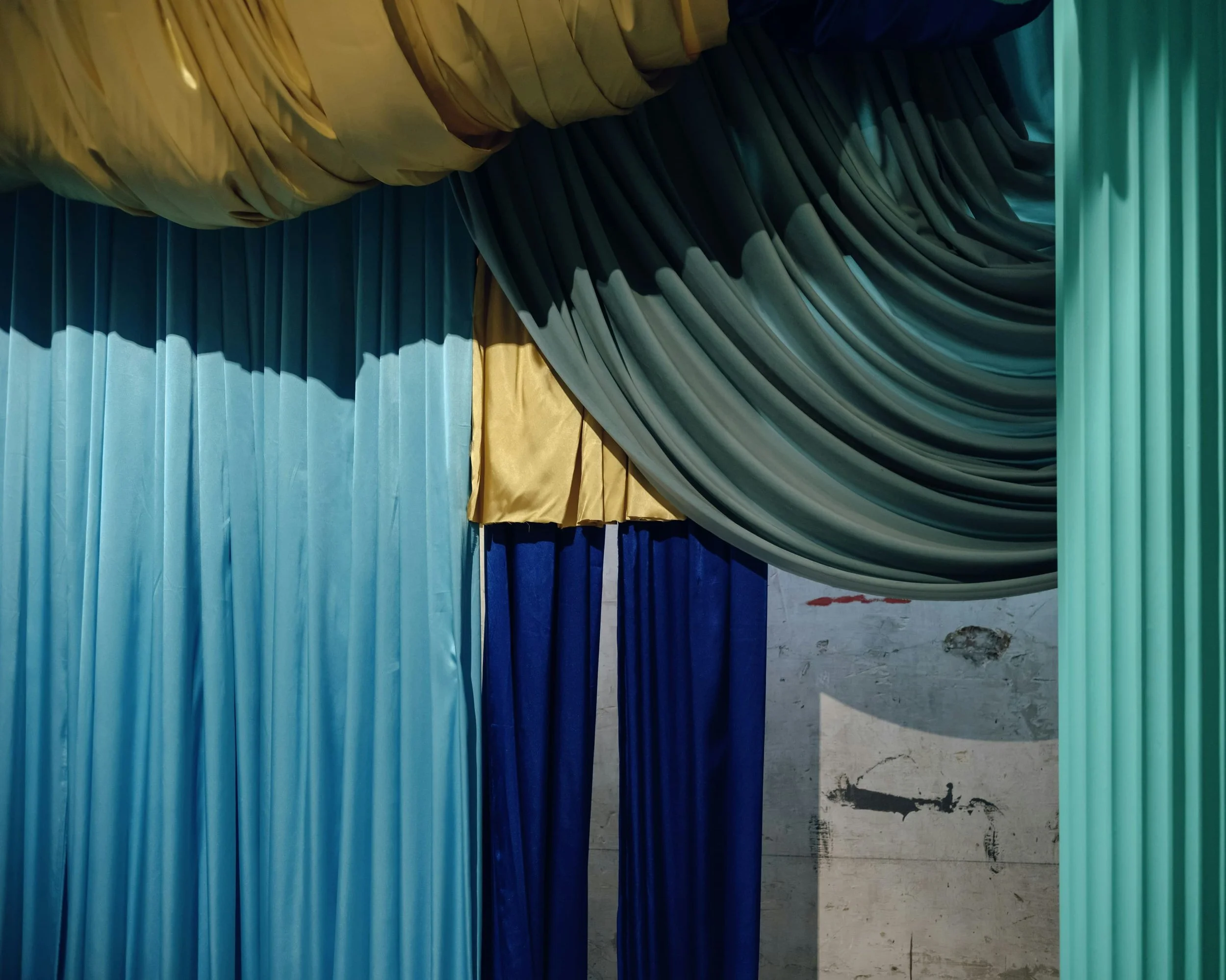 pipe and drape covering wall