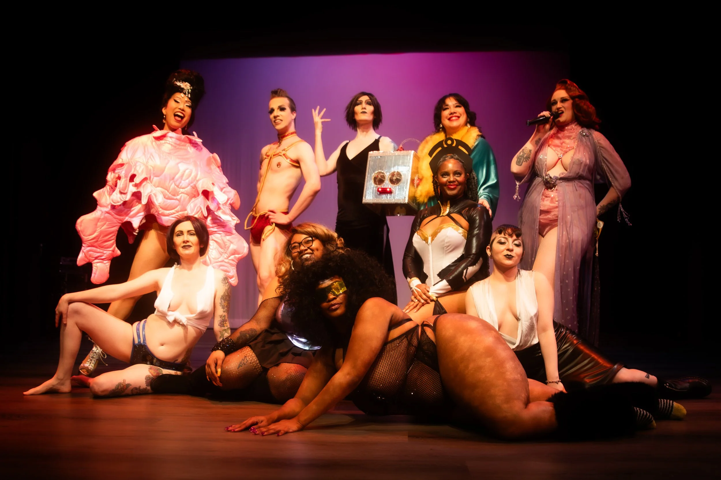 The cast and crew of Ass-tronauts & Robo-tits posing for a photo at curtain call.