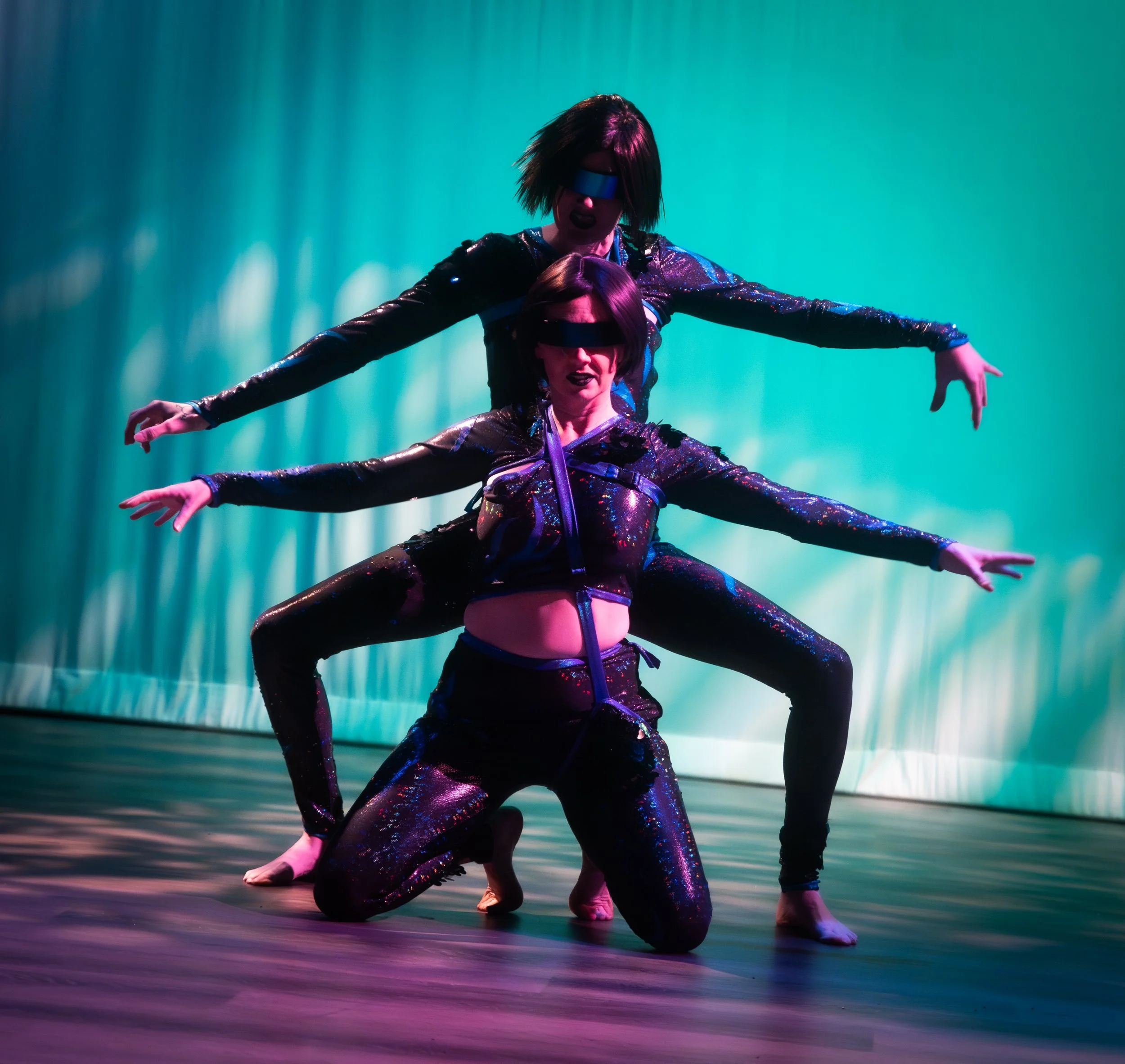 Crystal Storm and Scarlett O'Hairdye (known as #WifeGoals) performing at Ass-tronauts & Robo-tits as creepy aliens.