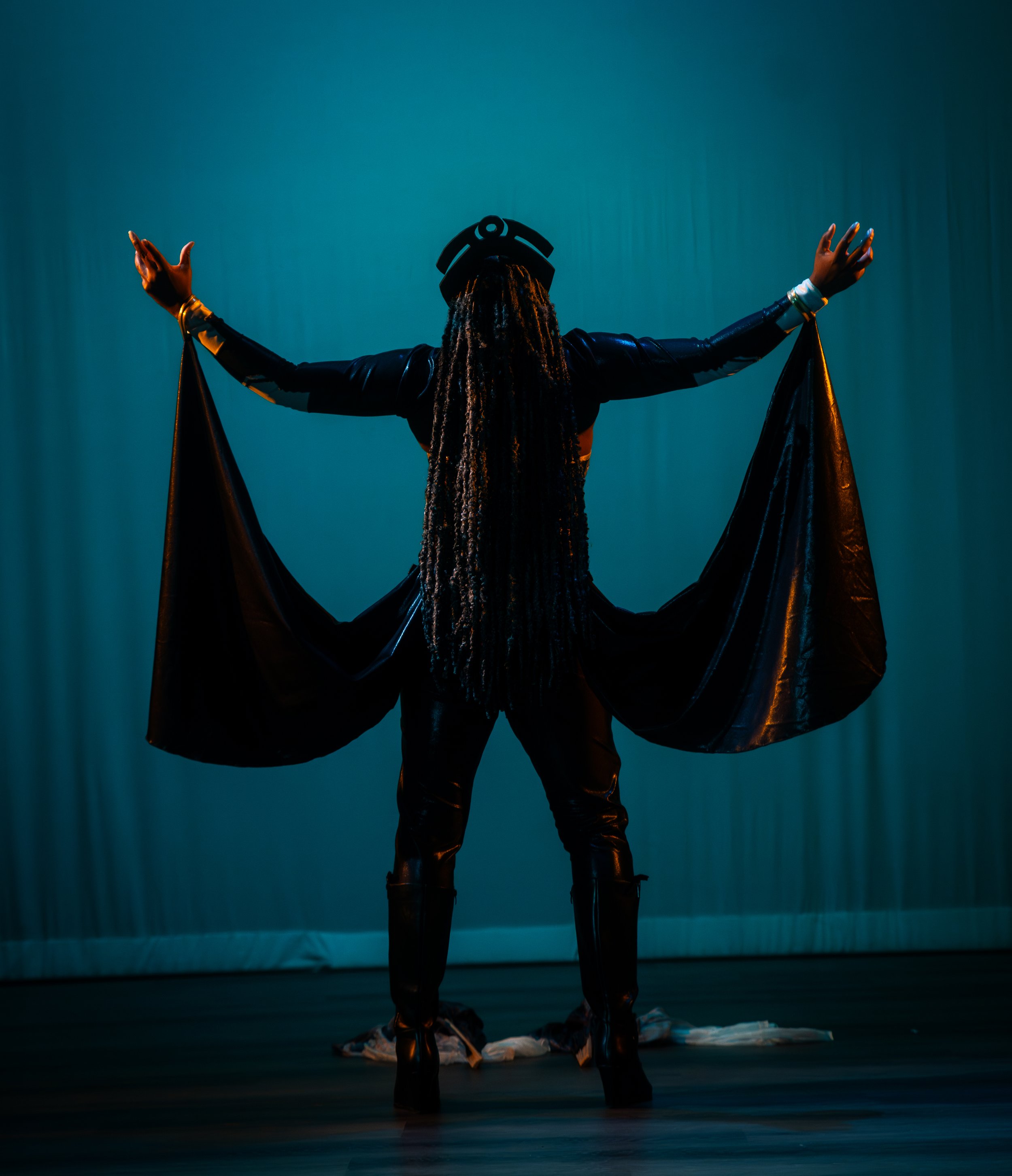 Onyx Asili performing at Ass-tronauts & Robo-tits as Storm from the X-Men.