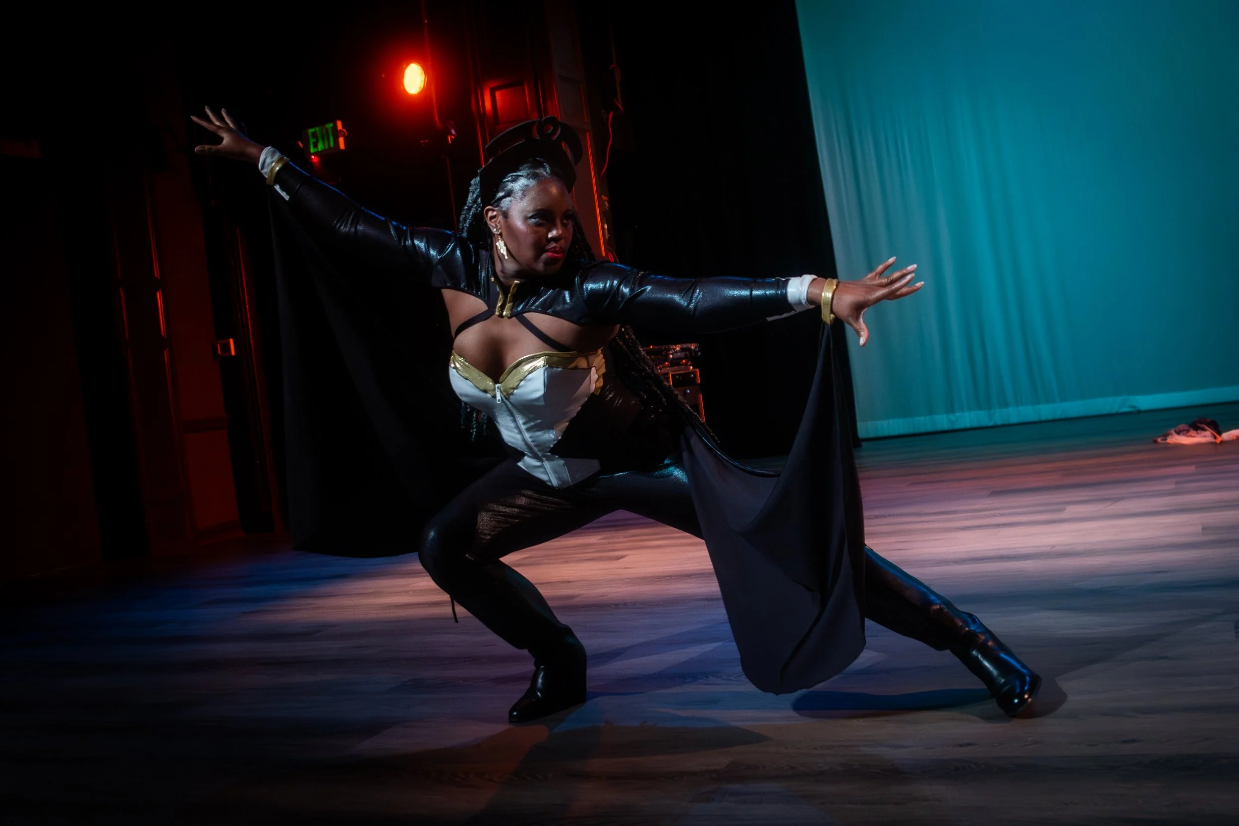 Onyx Asili performing at Ass-tronauts & Robo-tits as Storm from the X-Men.