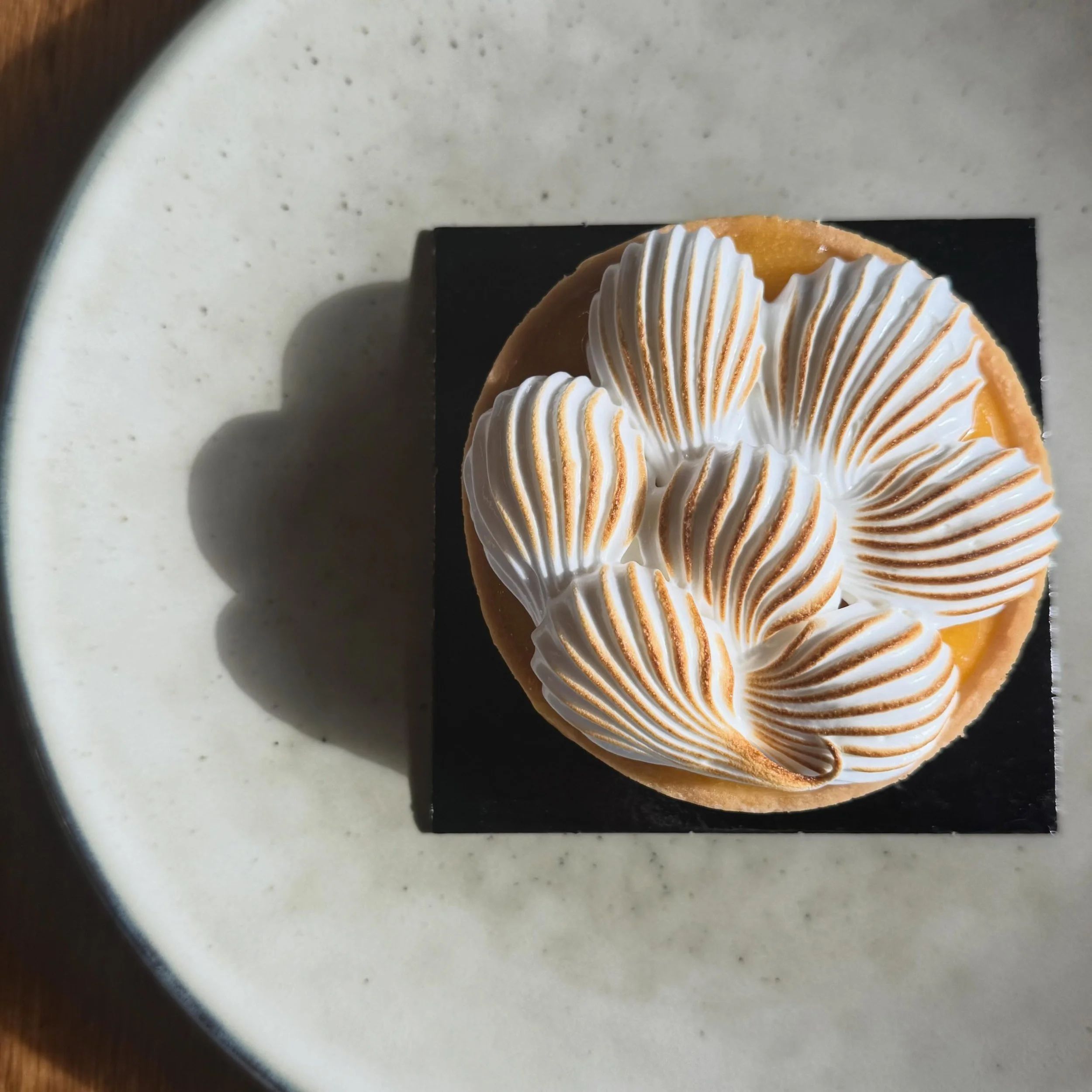 Lemon meringue tart with an artistic flair! Sweetness, zest, citrus &amp; lightness encased in perfect pastry. 

#theartisanfarmernabiac  #nabiac #lemonmeringue #barringtoncoast #midnorthcoastnsw