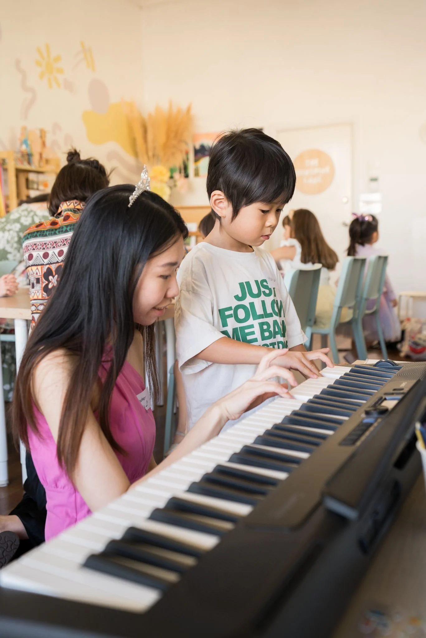 child learning piano