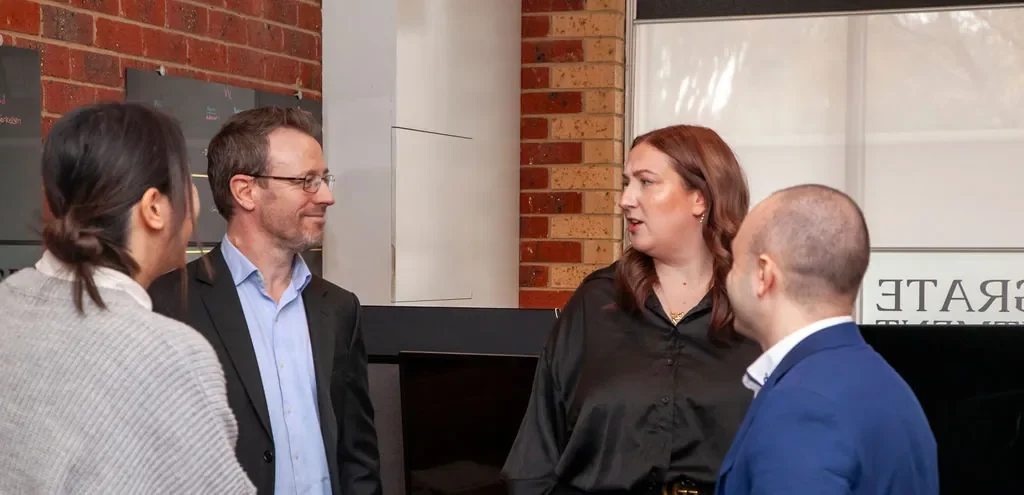 Integrate Recruitment consultants meeting with colleagues at the Melbourne office to discuss recruitment solutions for clients across Australia