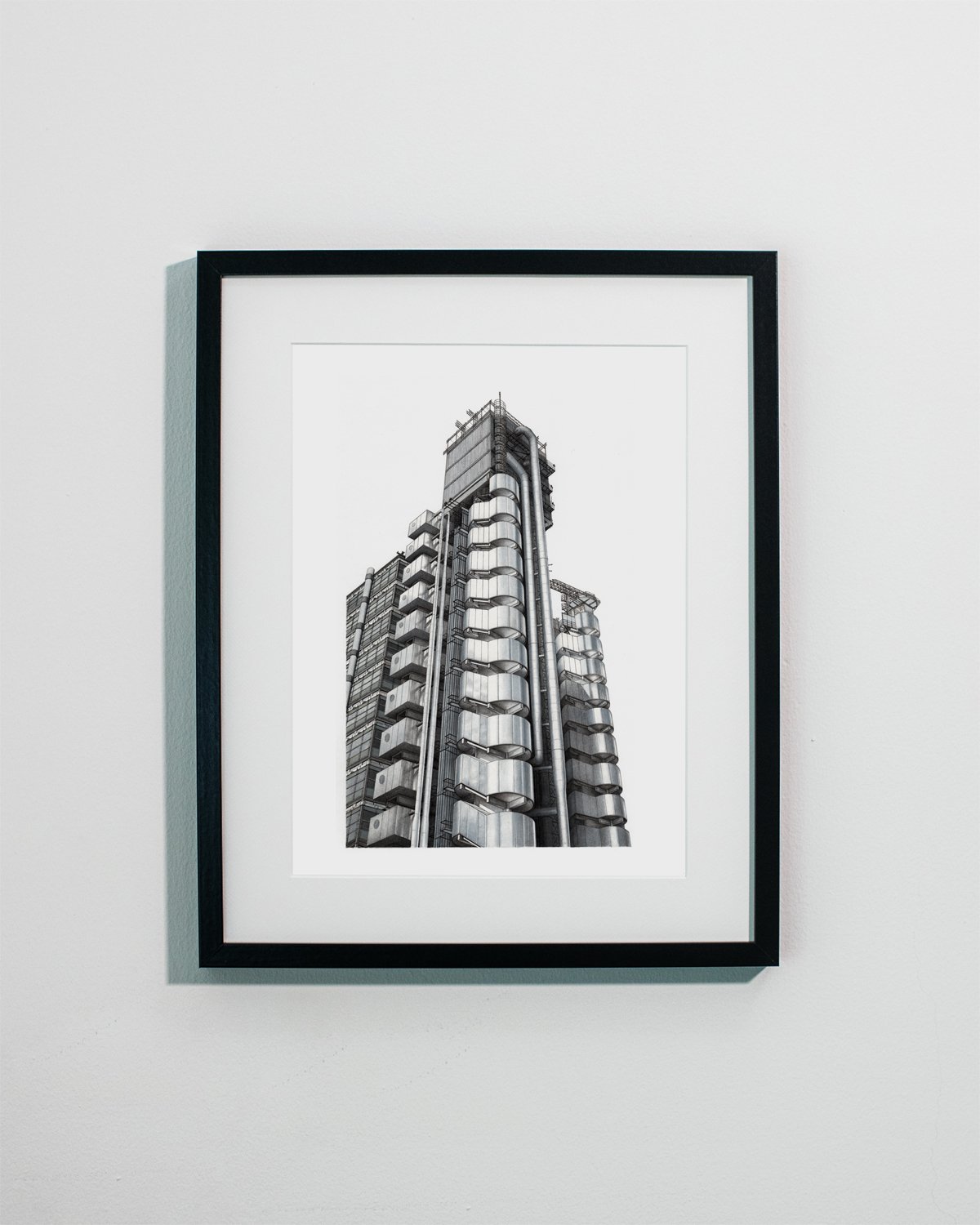 Lloyd's of London black frame on wall.jpg