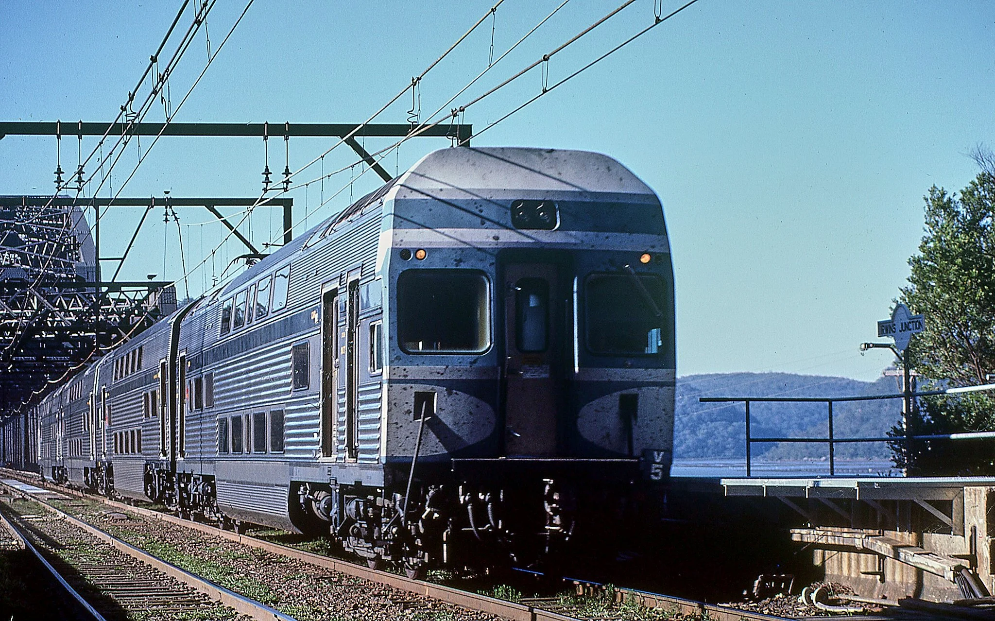 Four car V-set interurban Hawkesbury River bridge adjacent the workers platform. November 1986