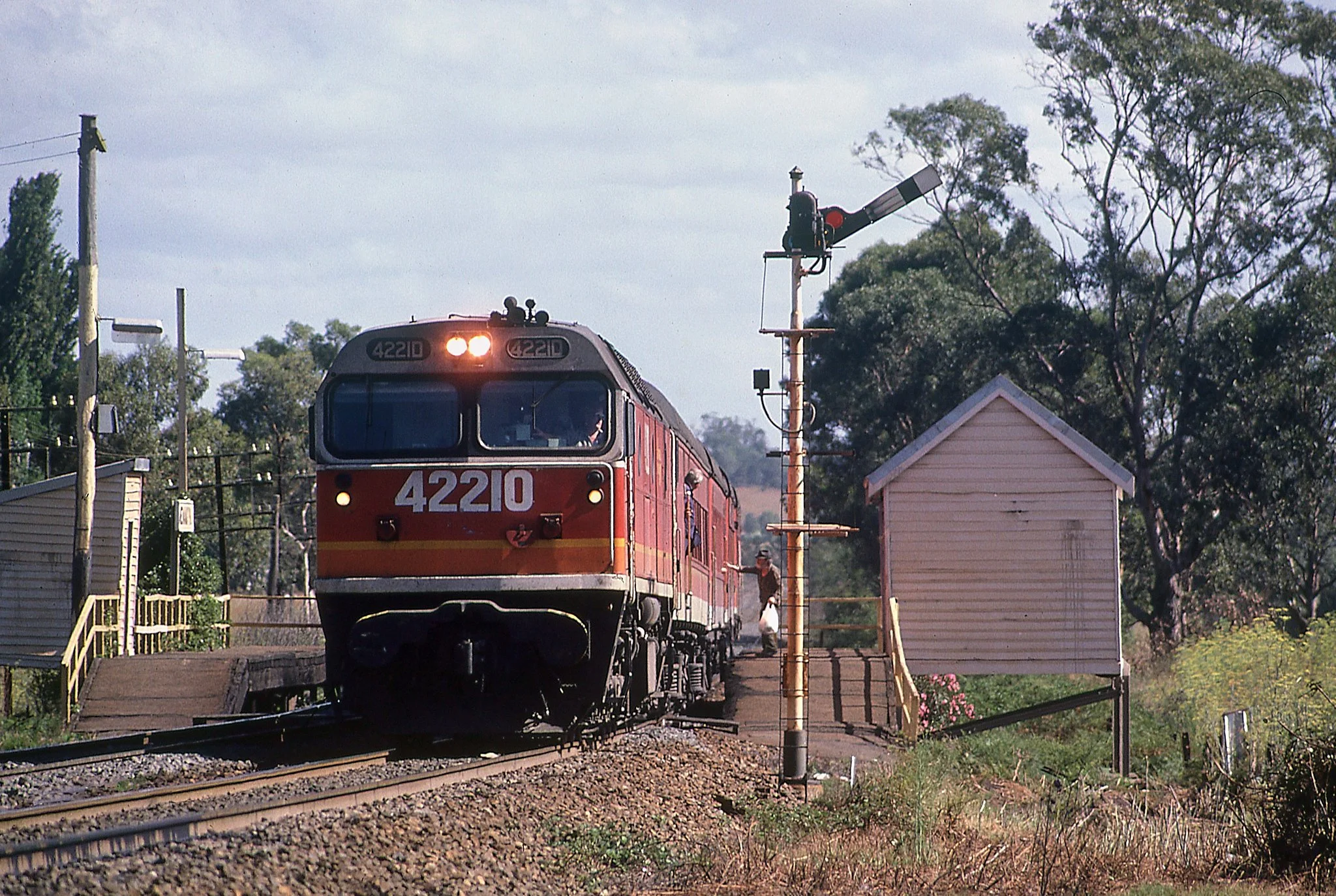 42210 leads an up direction passenger service at Menangle Park station January 1987