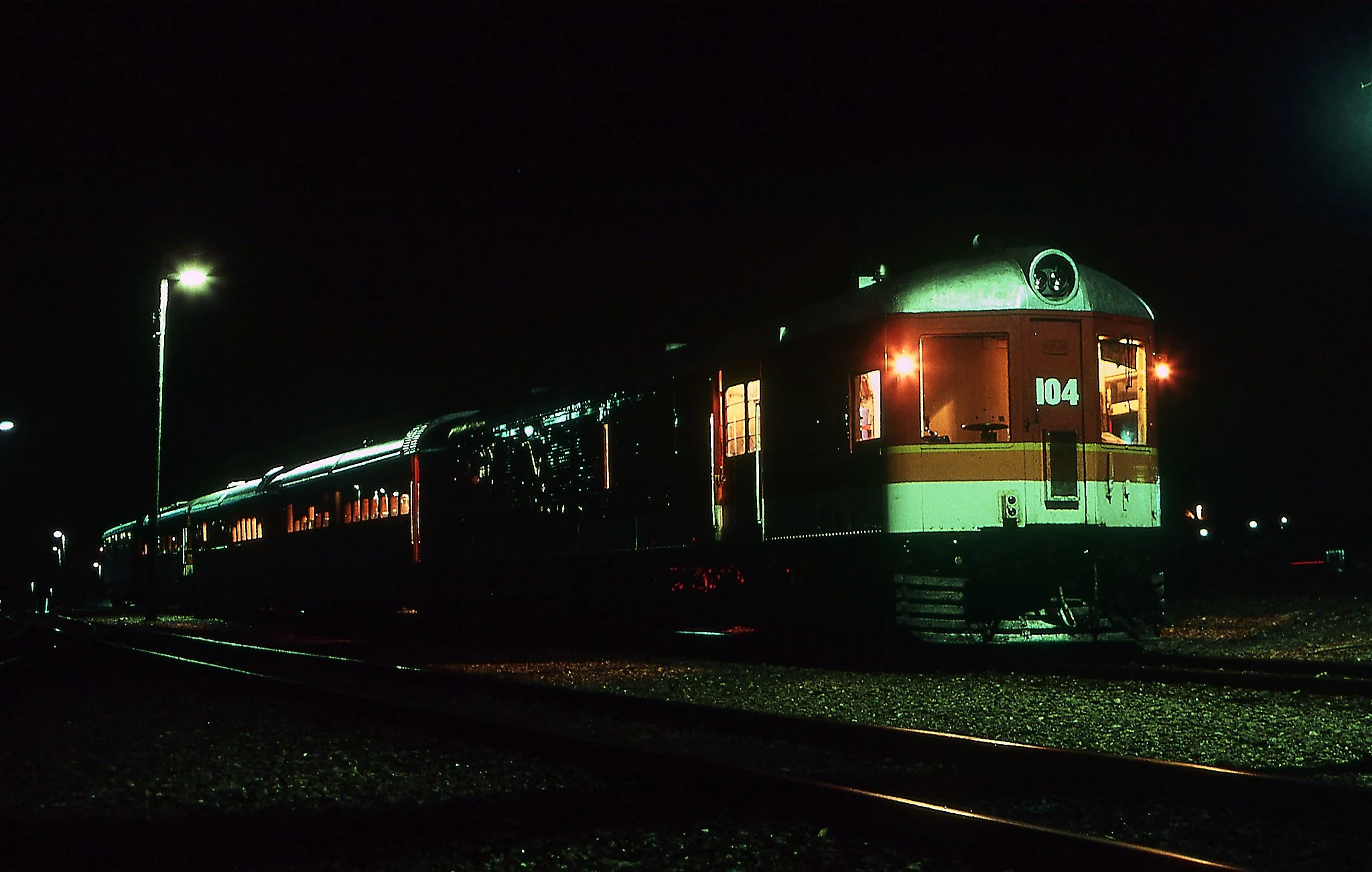 Silver City Comet led by DP104 stabled overnight at Broken Hill. December 1986.