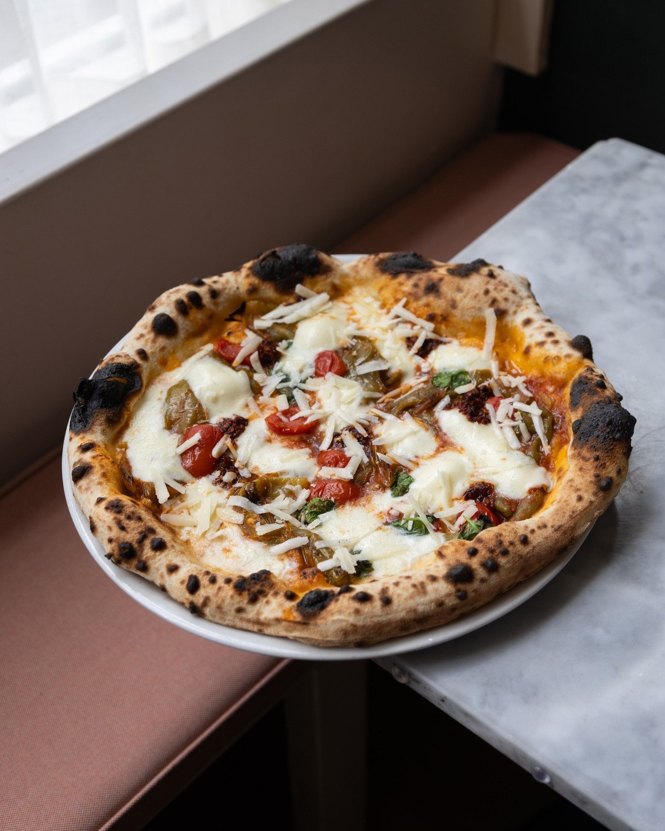 May's special is coming strong! Our Pizza Friggitelli, Salsiccia, Pecorino Romano is an explosion of different flavors, bringing together a handful of incredible ingredients representative of Southern and Central Italy: sweet, non-spicy Friggitelli p