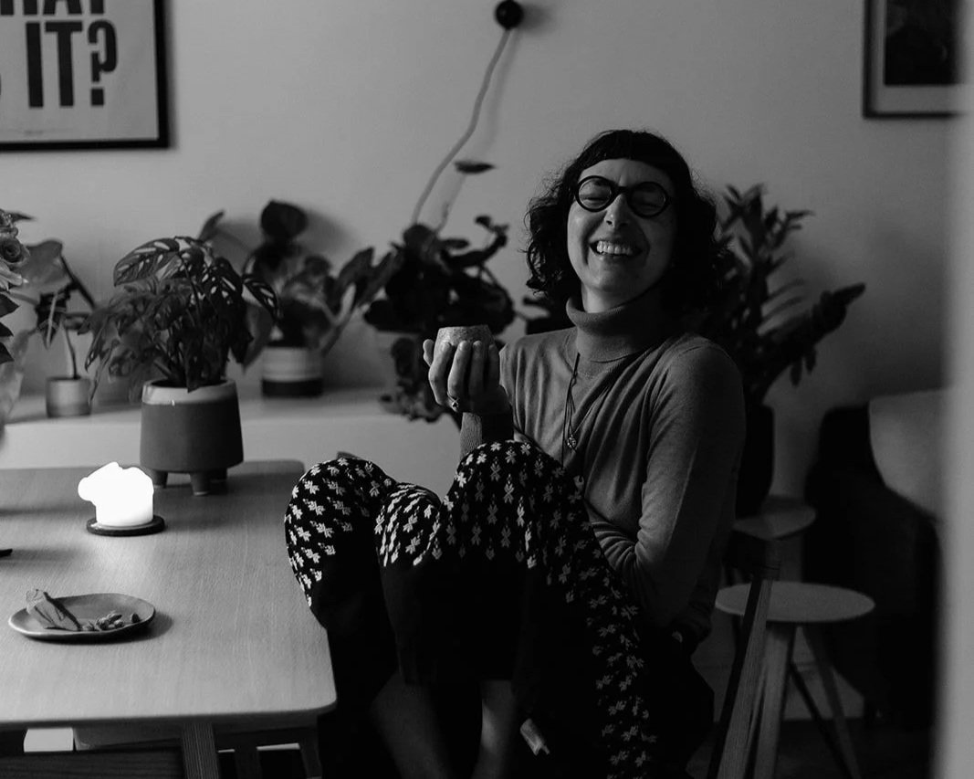 Hands on heart in a grounding moment – photo by Celie Nigoumi, reflecting inner connection