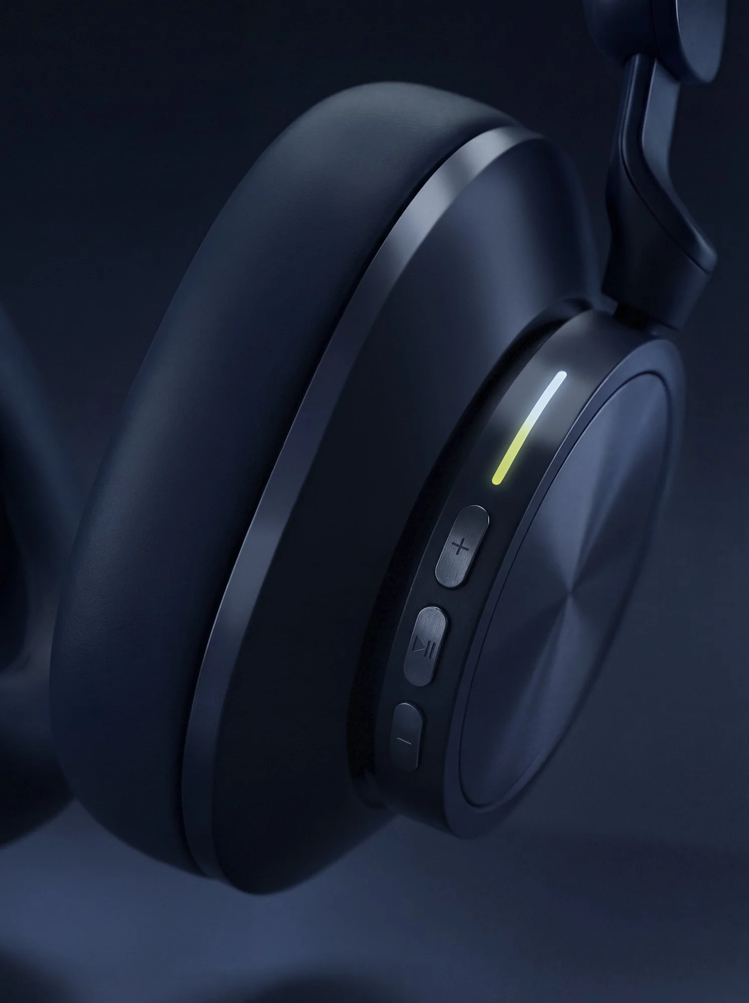 Close-up of wireless headphones showing control buttons and LED indicator, AI-generated image enhanced with detailed Photoshop retouching.