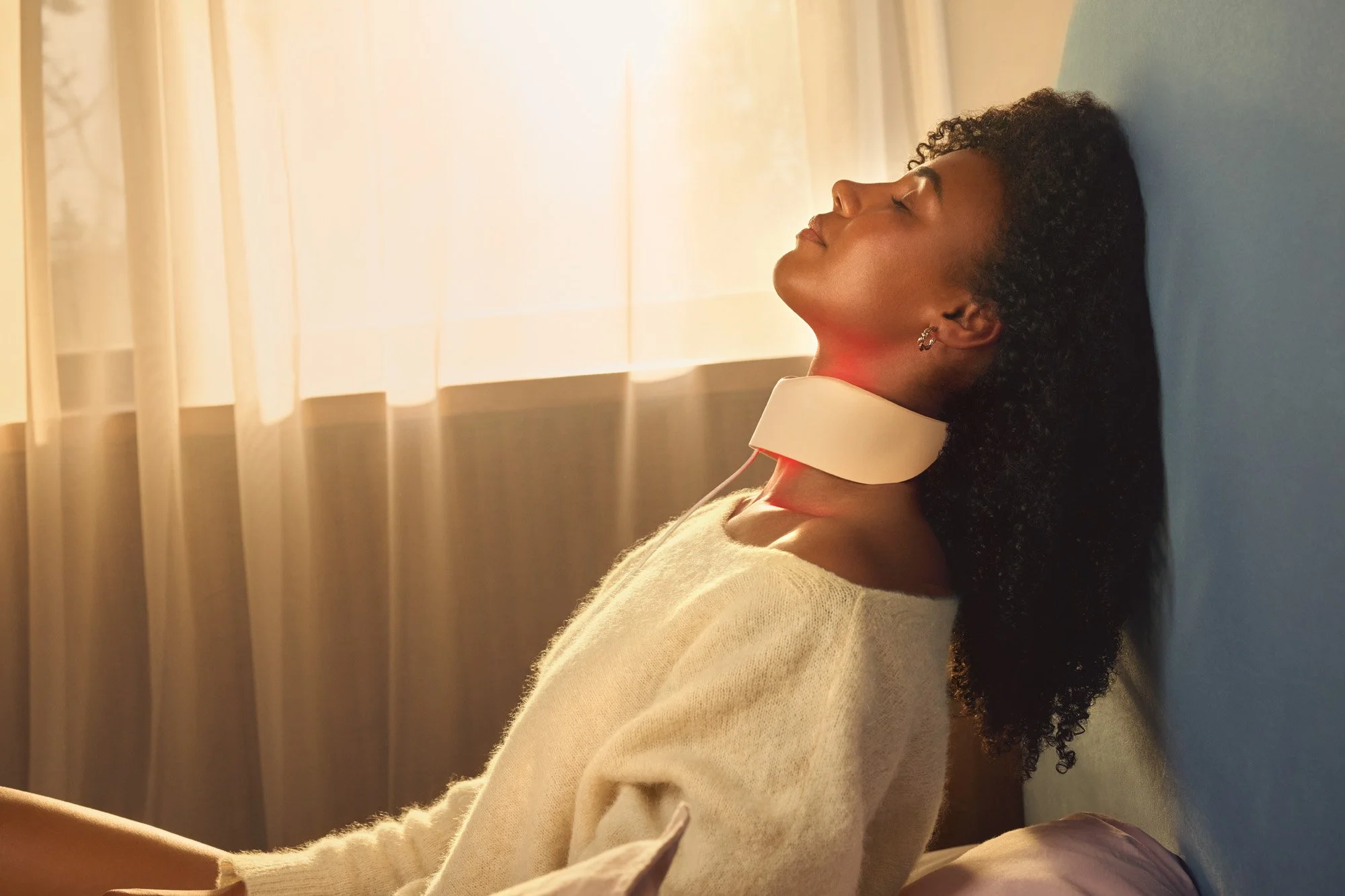 Philips Personal Care | a beauty shot of a woman utalizing ReAURA LED mask