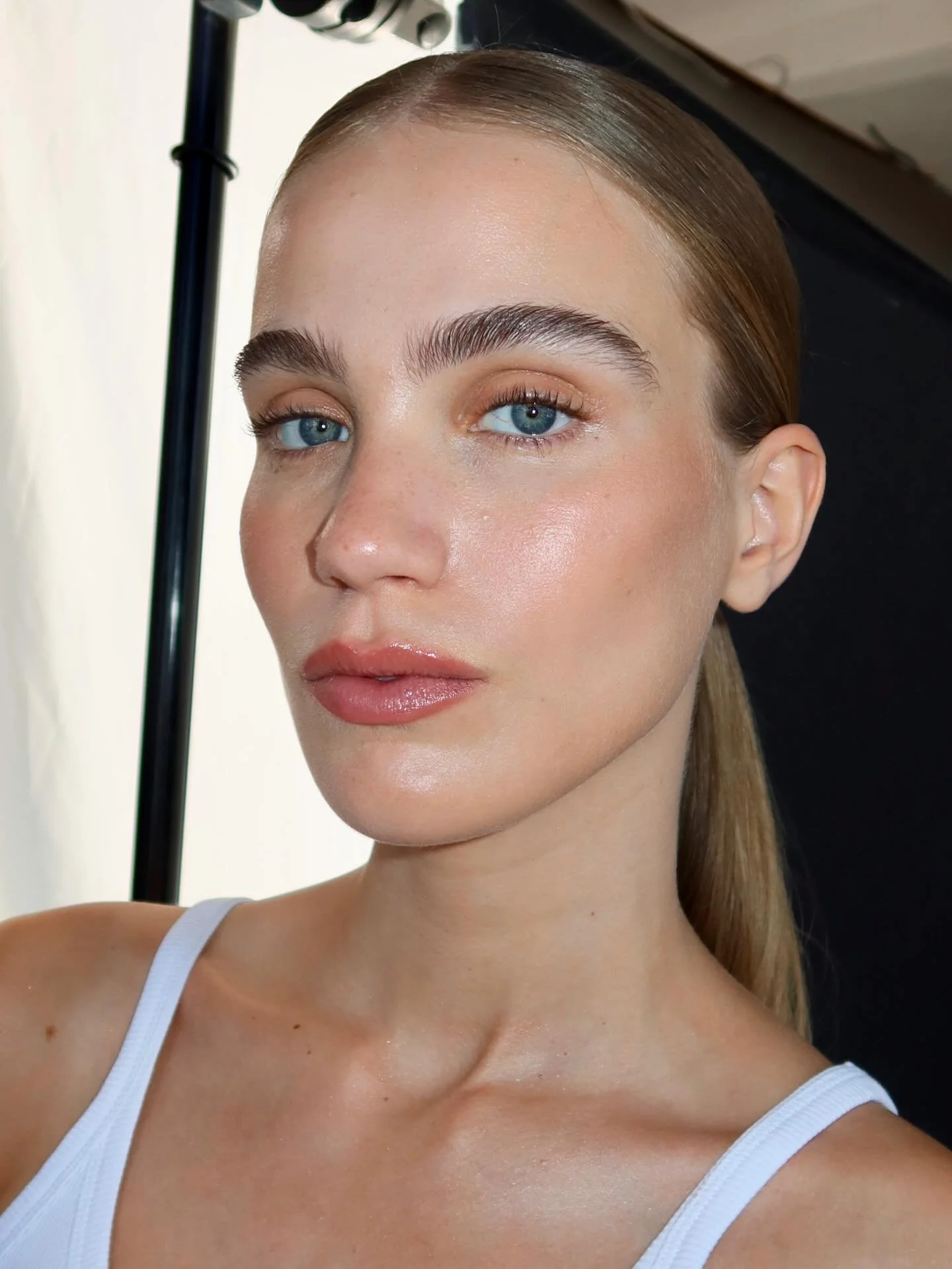 Different lighting = different makeup results. 

As I mentioned before, flash lighting helps make makeup look crisp. I always test on my camera before the model goes on set, using different lighting setups to check how the makeup and shades translate