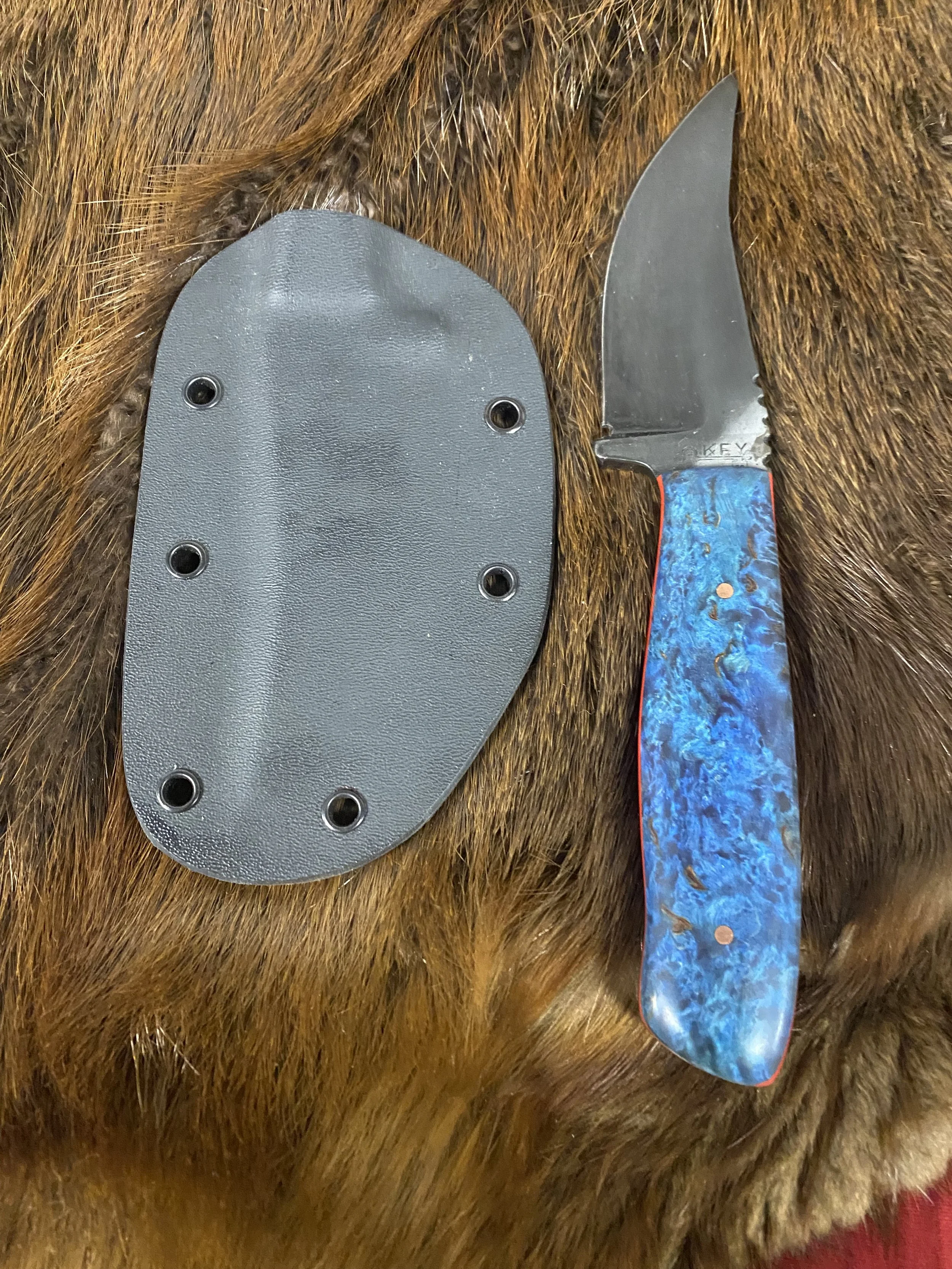 Sharp finger with Blue Masur Birch handles