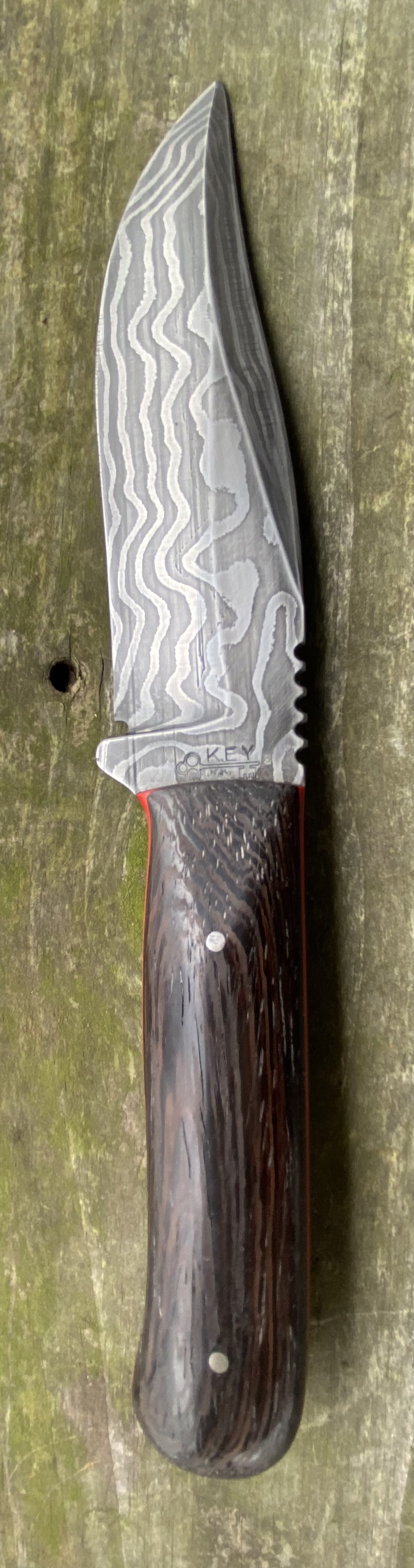 Bold Random Pattern Damascus with Ebony Handle