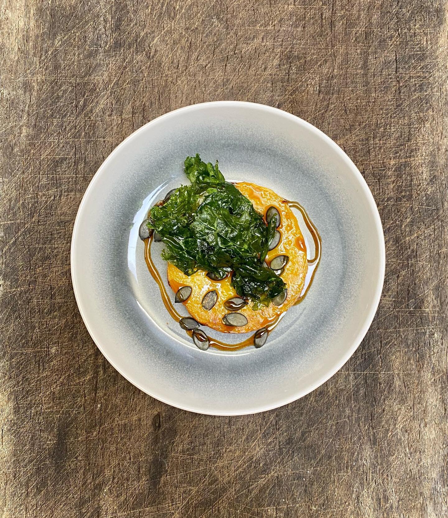 ROASTED GRAMMA PUMPKIN
a sweeter pumpkin, grown at @thefallsfarm and baked in the wood-fire smoker. Garnished with roasted pumpkin seeds and a glaze made of the roasted skins. Half of the seeds we then save for @greenharvestgardening 🌱