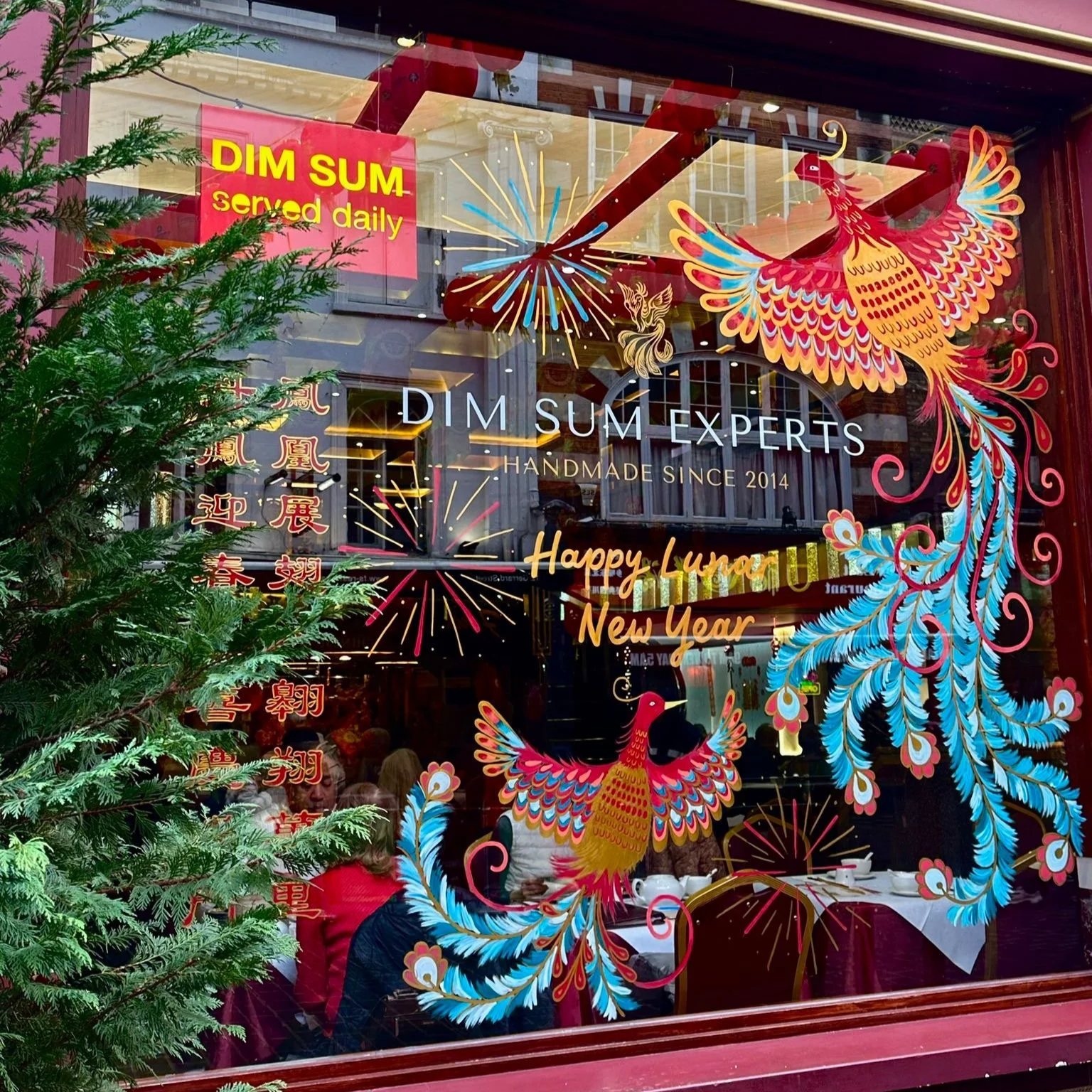 Lunar new year window art for Chinatown restaurant