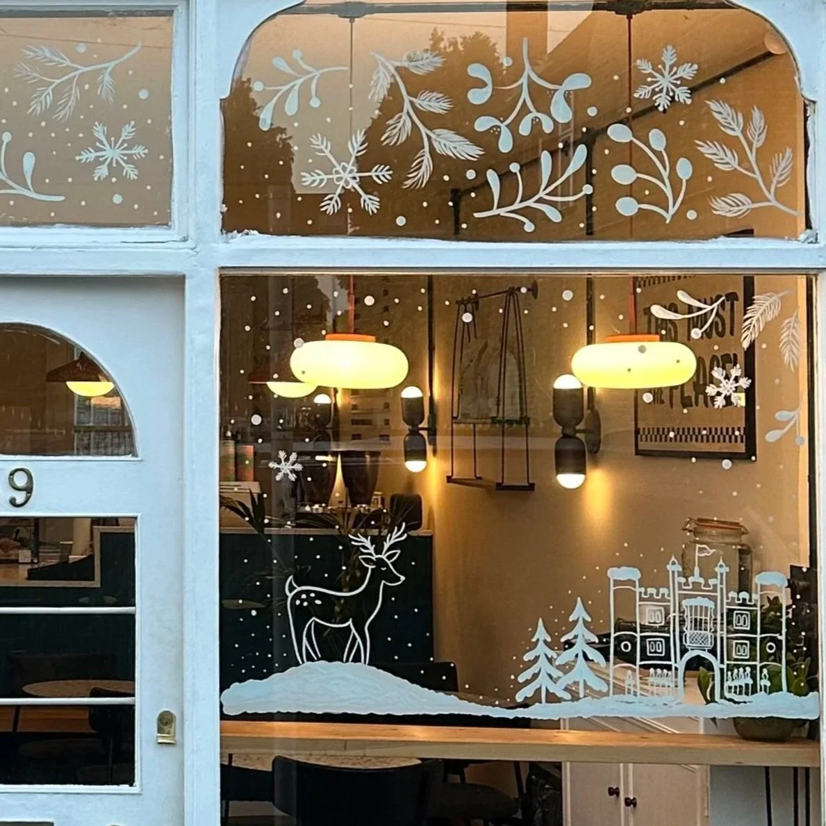Winter window art at a coffee shop