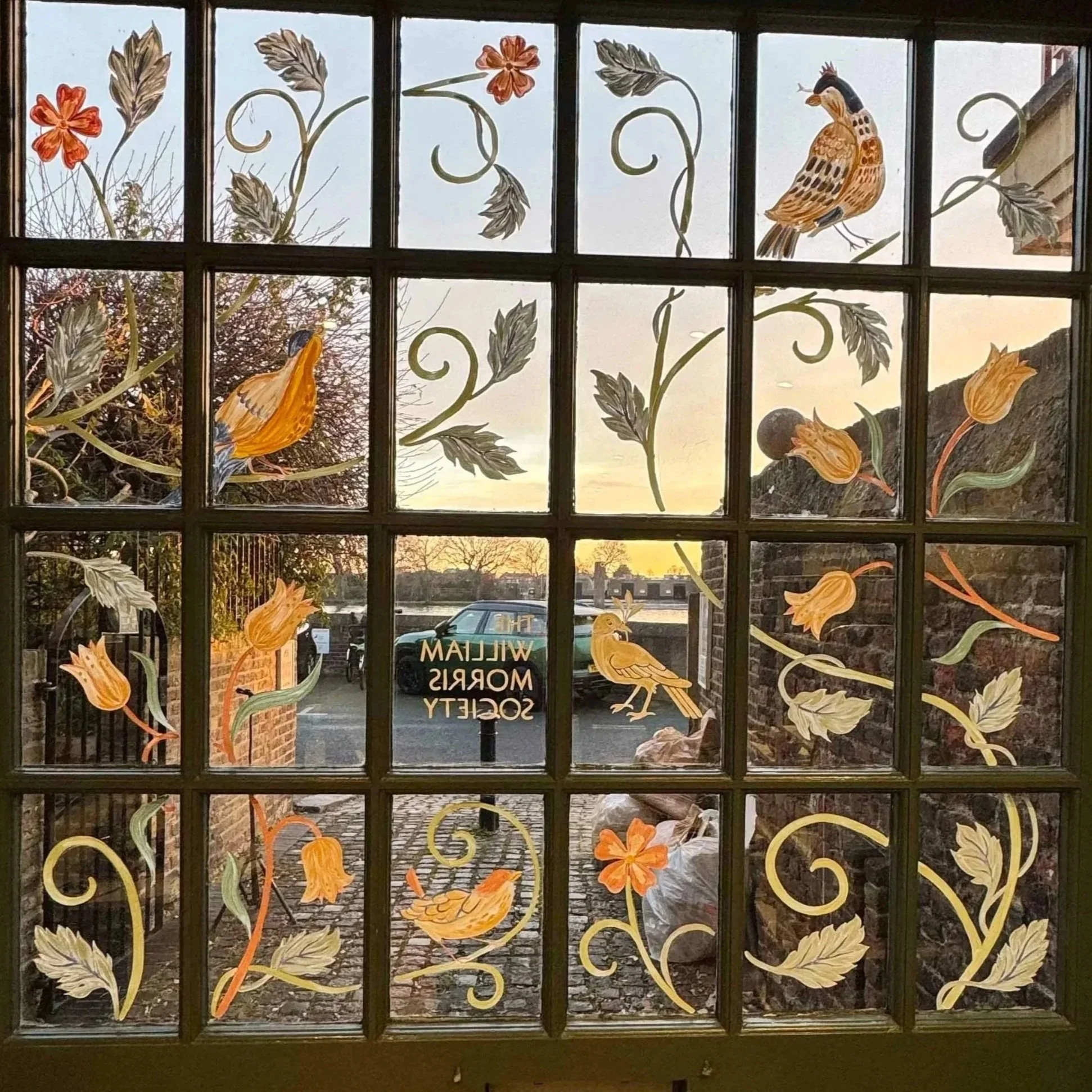 botanical window art viewed from inside