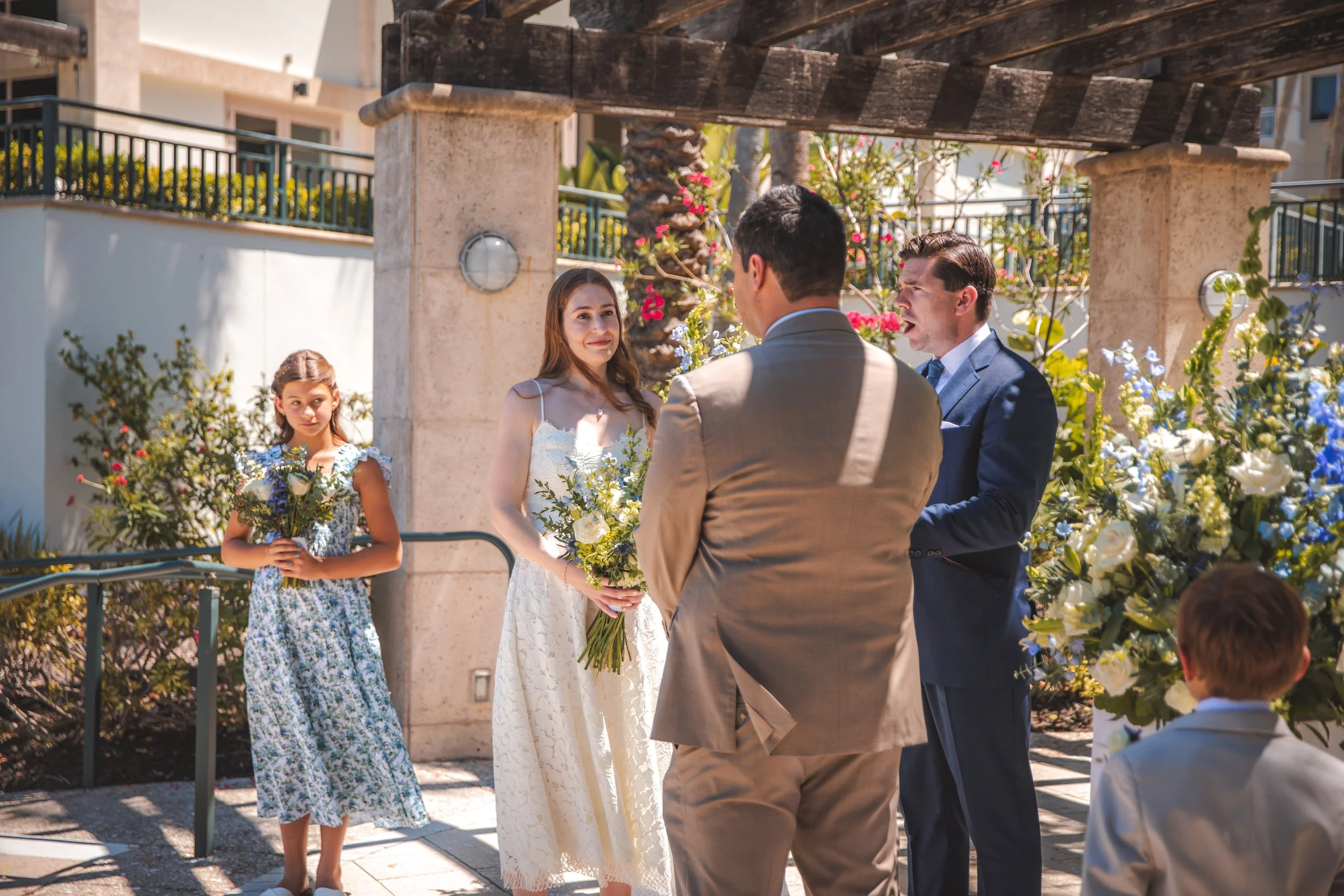 Intimate outdoor wedding ceremony overlooking the Gulf at the Ritz-Carlton Beach Club