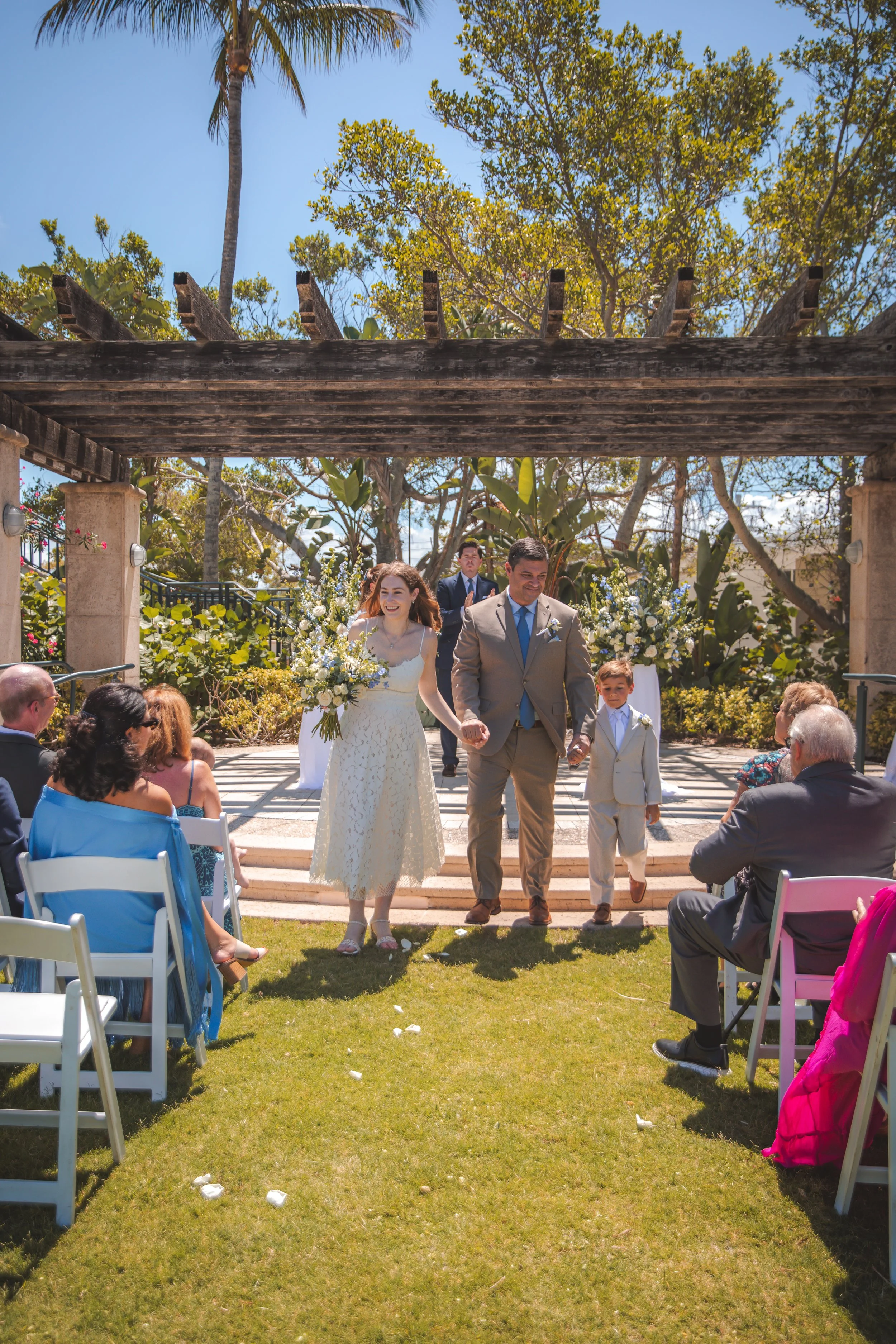 Intimate outdoor wedding ceremony overlooking the Gulf at the Ritz-Carlton Beach Club