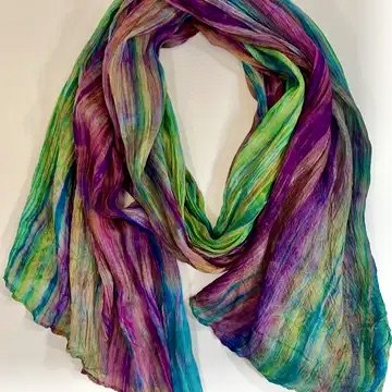More of our extremely popular hand dyed silk scarves. just arrived! Thery are called waterfall scarves as they cascade with blended colors in a crinkled silk effect. Perfect for a colorful light weight spring accessory.
