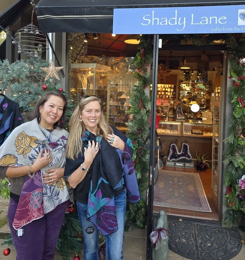 Just arrived in December more of our very popular Loop Shoulder Wraps! Modeled By Marie and Mariana.
