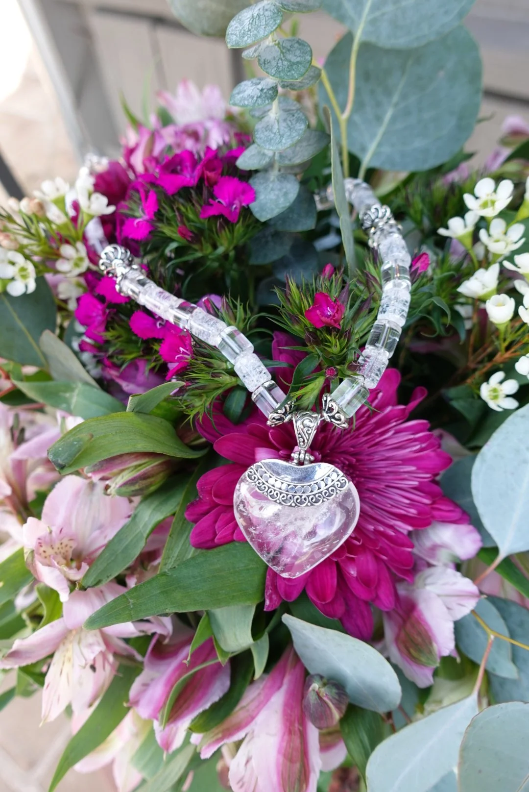 Necklace by Mountain View artisan Sandy Van Mell. Sandy has sourced semiprecious stones Swarovski Crystals, coral, amber and pearls to create beautiful wearable art pieces.