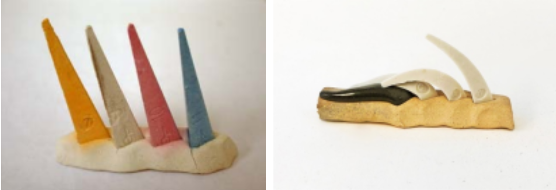  
Figure 2:
Left Cone pack containing cones 3 (orange), 5 (white), 6 (red) and 7 (teal). Right cone pack represents the left cone pack post-firing (12).
