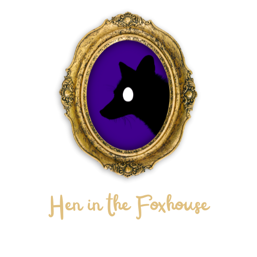 Silhouette of a black fox with a white eye inside an ornate gold frame on a purple background.