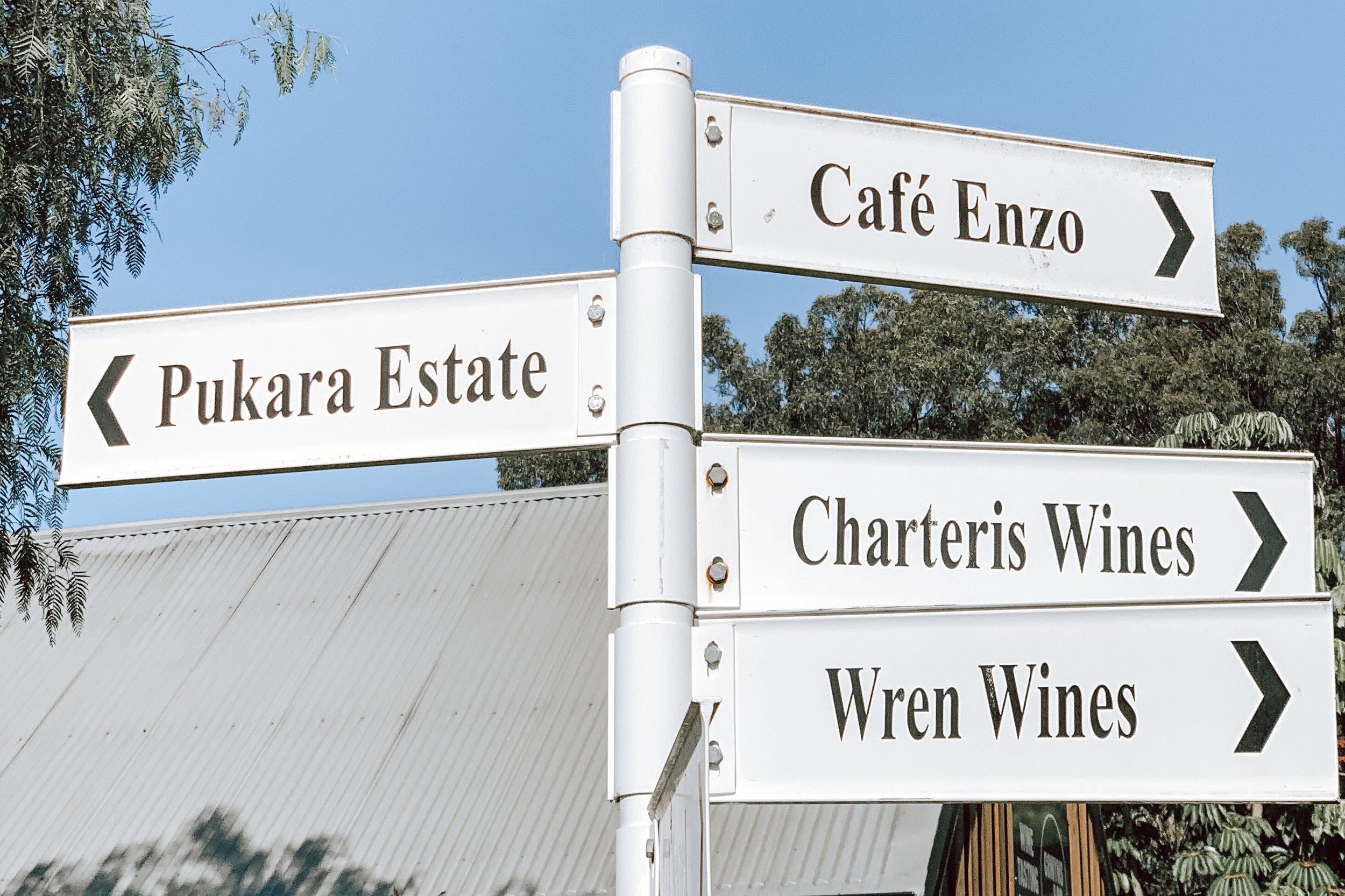 peppers-creek-village-sign-cafe-enzo-wild-wren-wines.jpg