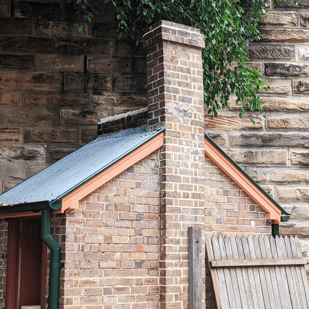 a paint stripped outhouse at 29-31 george street the rocks showing the original stonework after paint removal