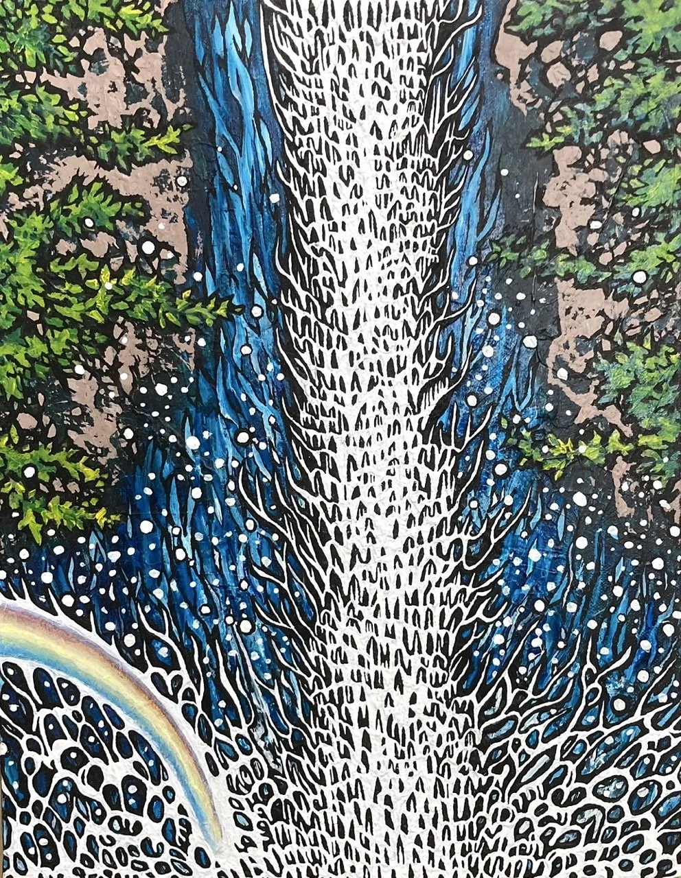 A rainbow over a waterfall 1